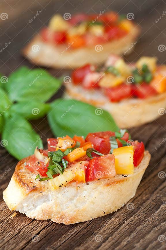 Bruschetta Topped with Tomato, Paprika, Garlic Stock Image - Image of ...