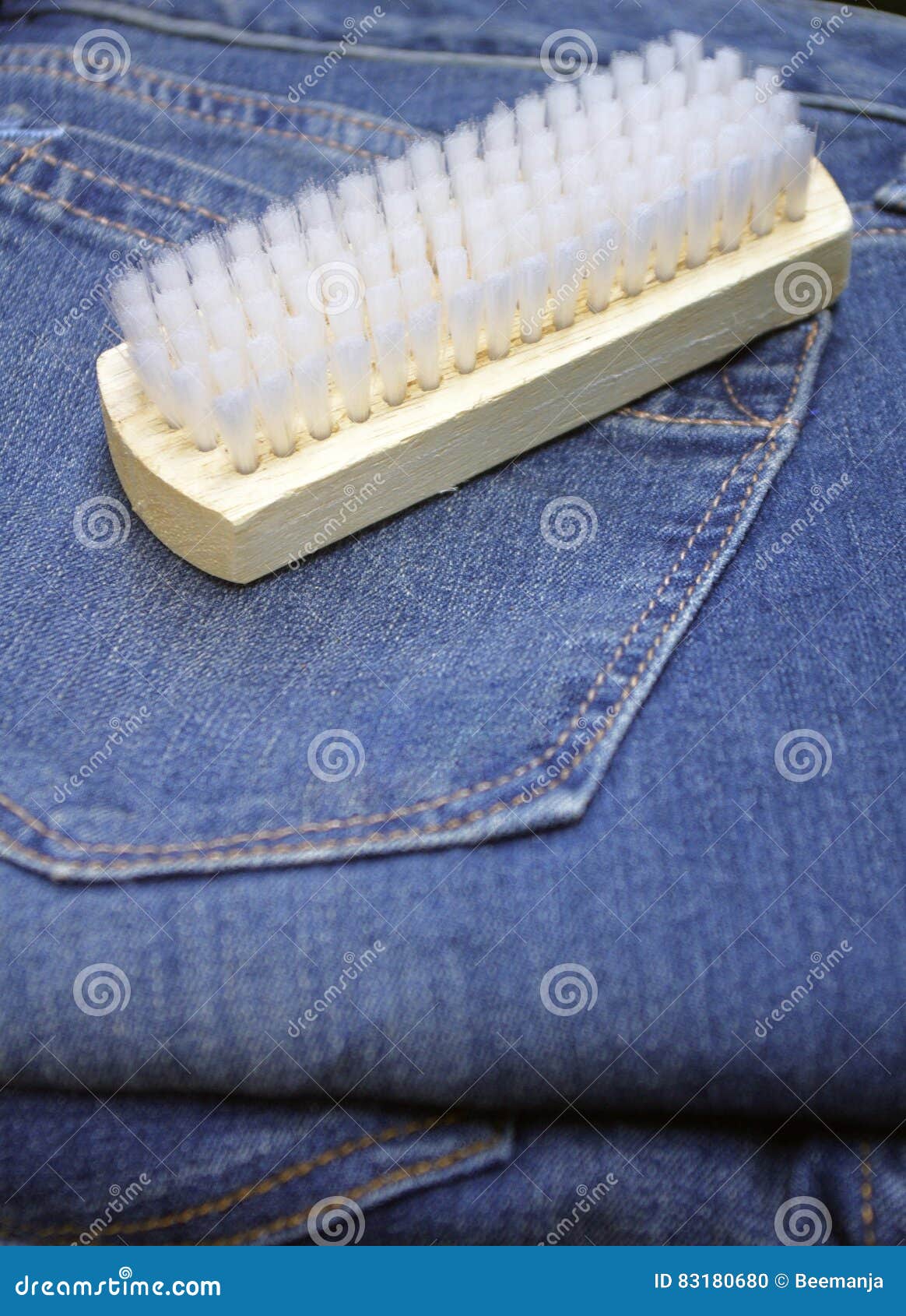 Brush on blue jeans stock photo. Image of backdrop, fashion 83180680