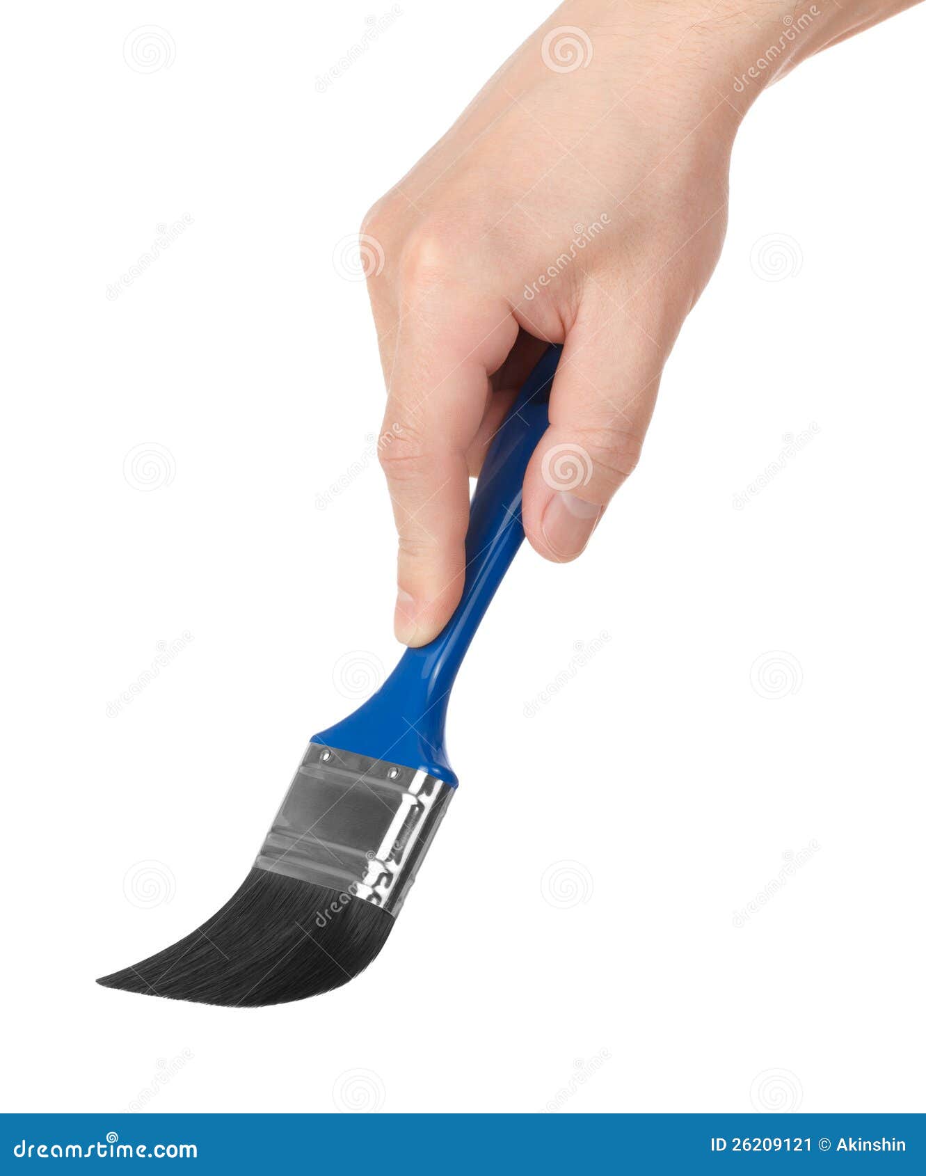 Brush in a hand on a white background