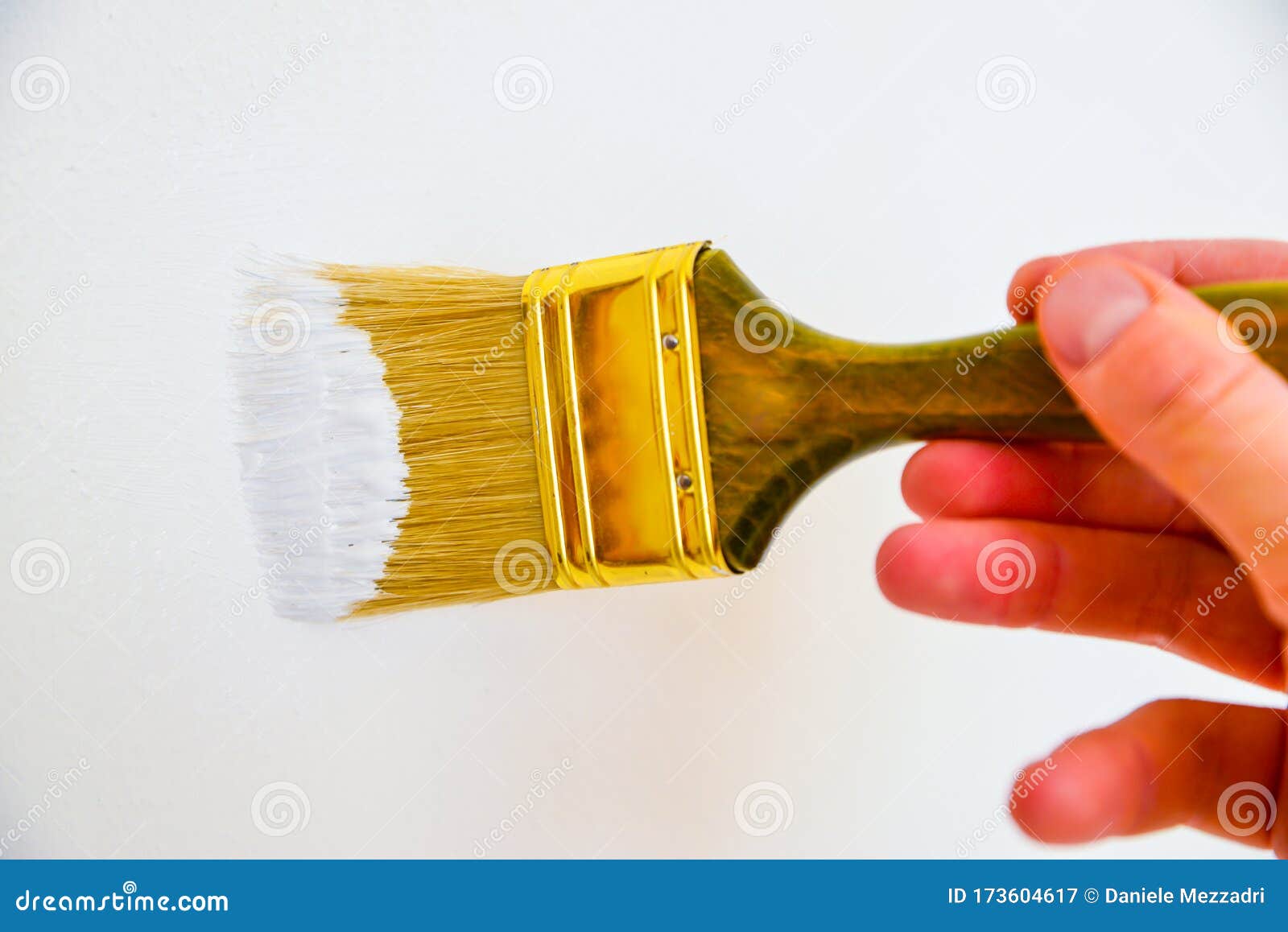 A brush paints a wall stock image. Image of maintenance 173604617