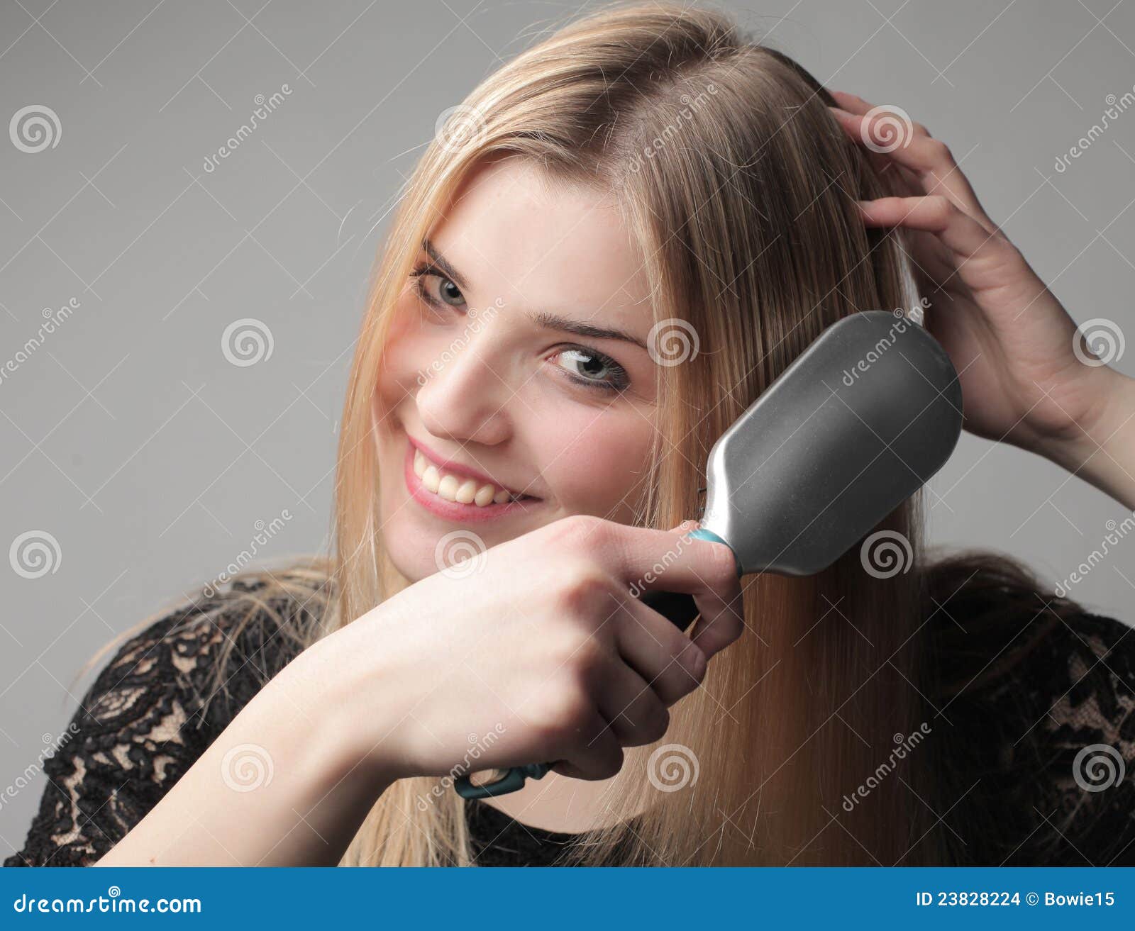 Brushing hair stock photo. Image of comb, blonde, girl 23828224