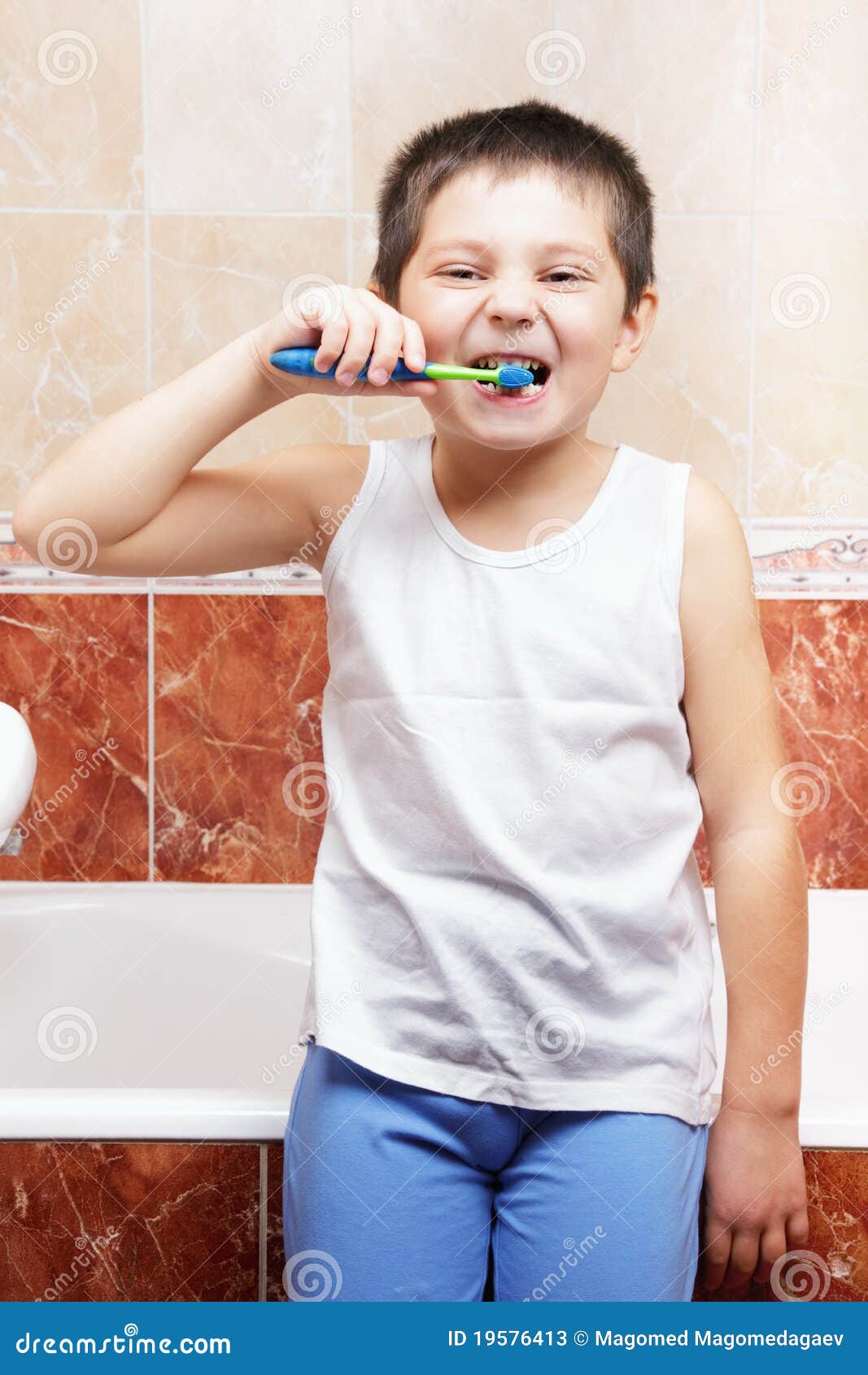 Brushing teeth in bathroom stock image. Image of freshness 19576413