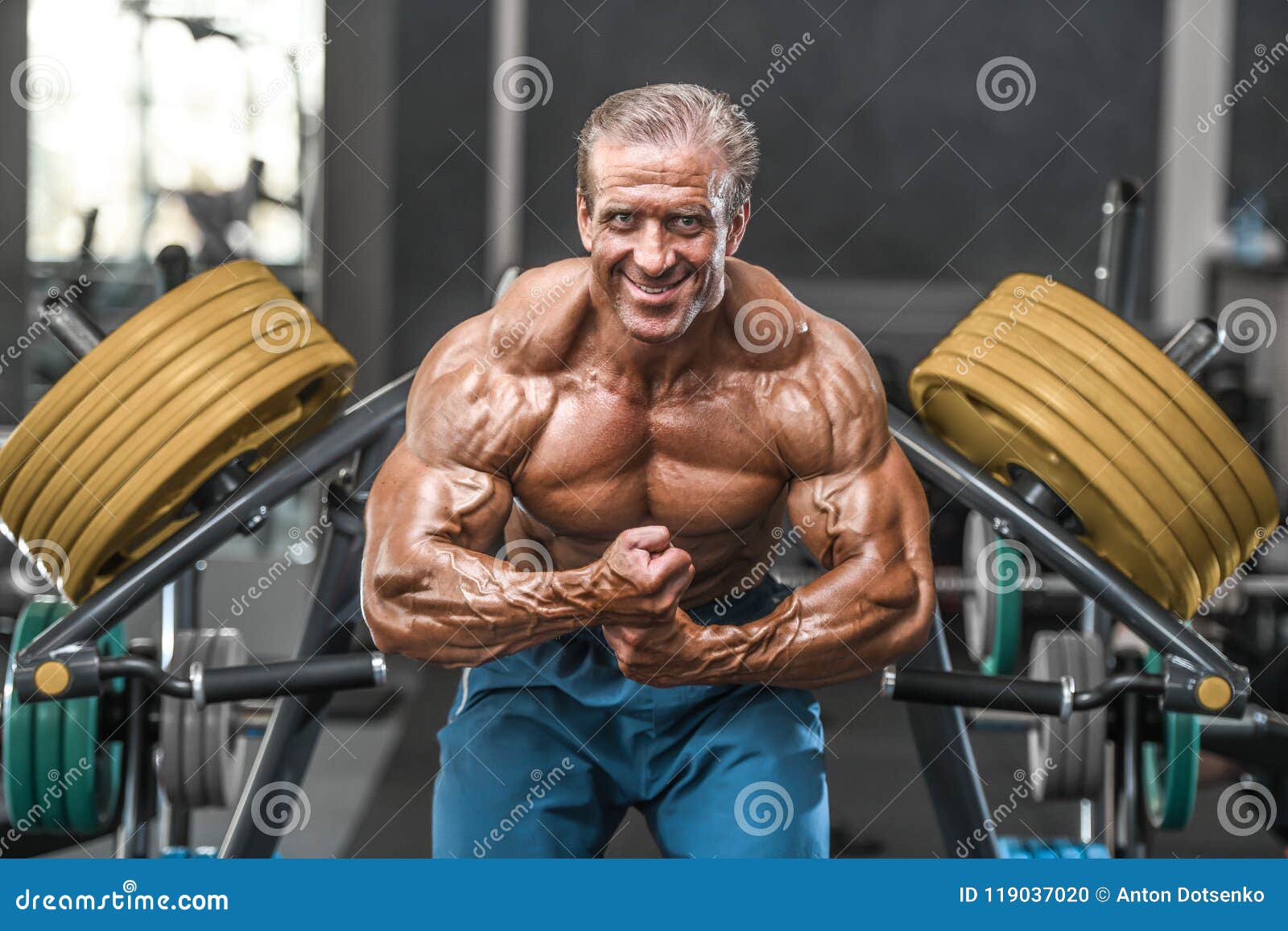 Brutal Aged Strong Bodybuilder Athletic Men Pumping Up Muscles W Stock ...