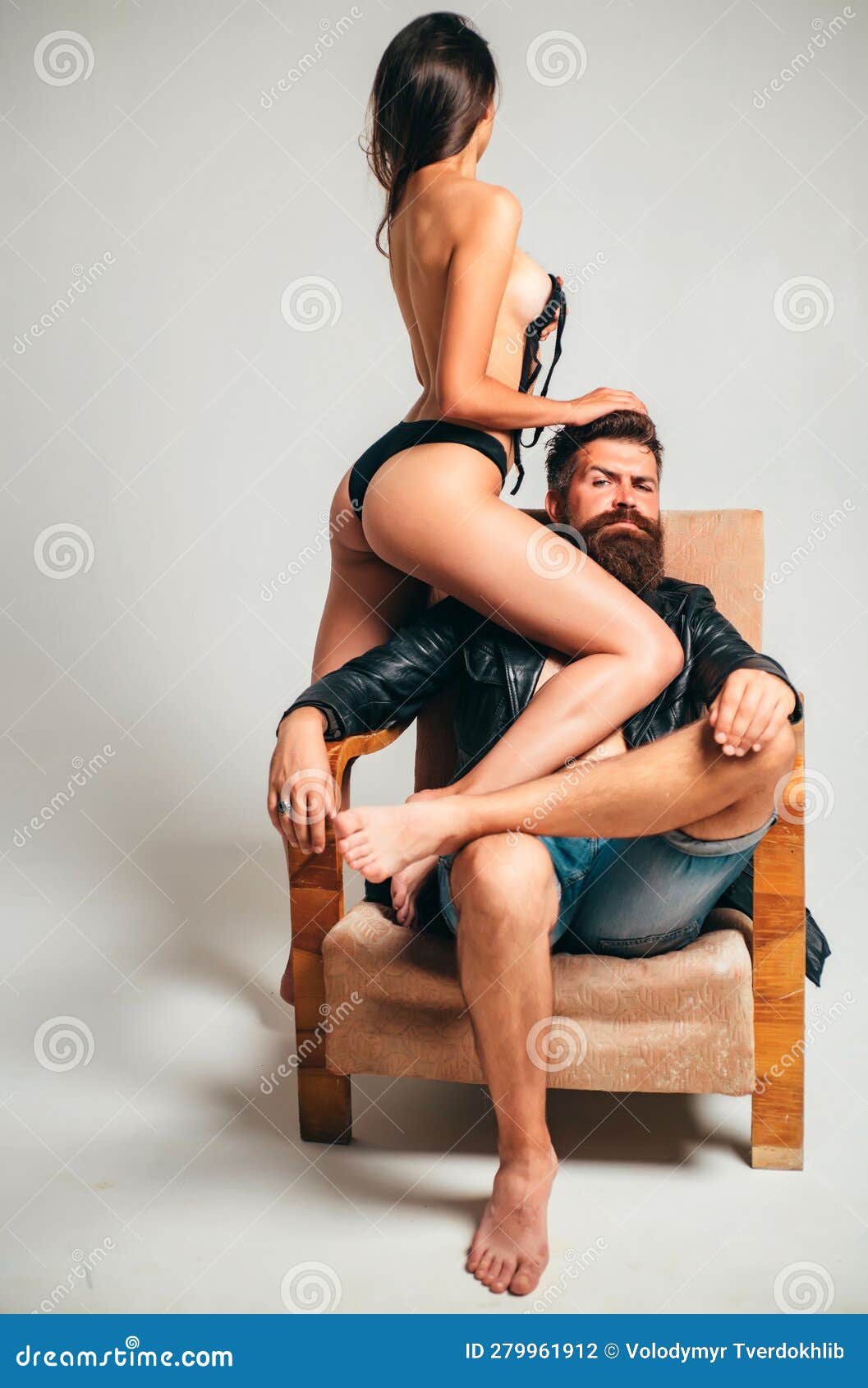 wife striptease on chair