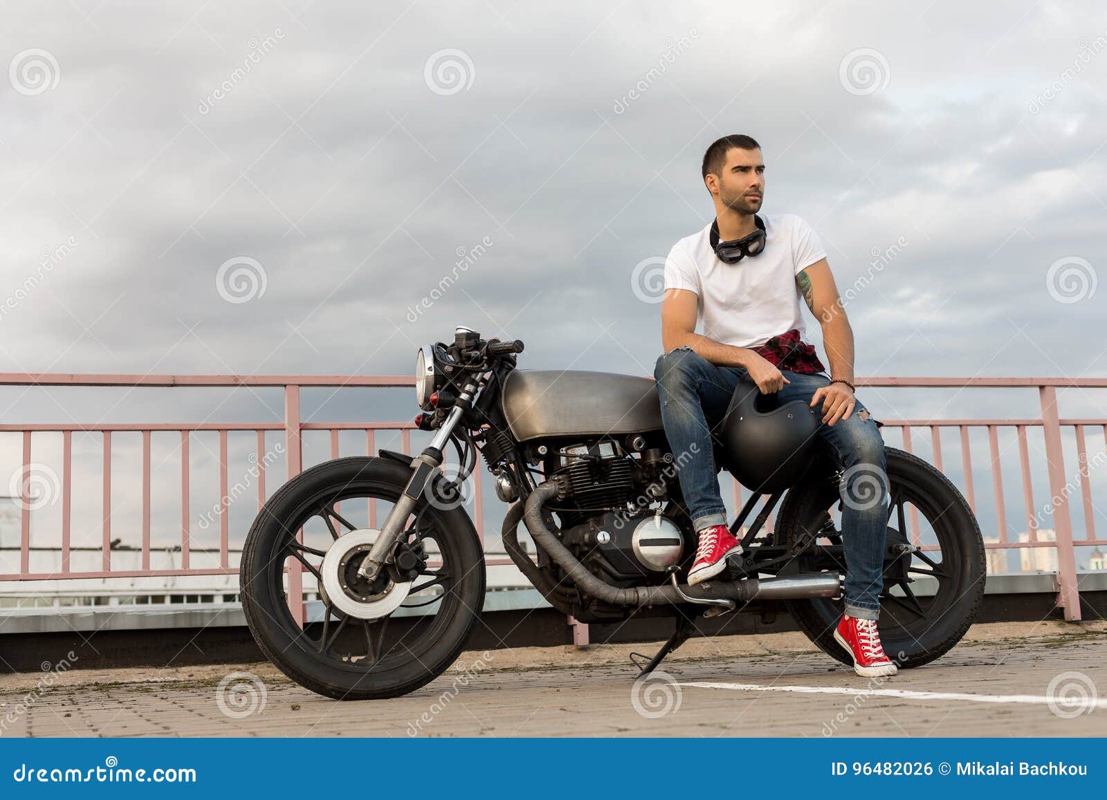 Brutal Man Sit on Cafe Racer Custom Motorbike. Stock Photo - Image
