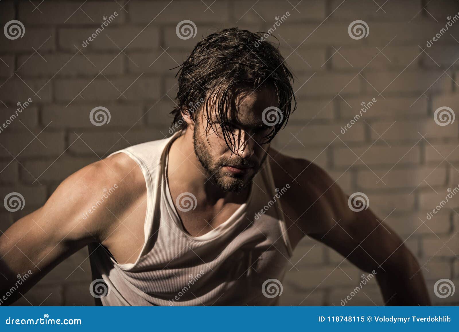 brutal wet man. sleepy man with beard undress