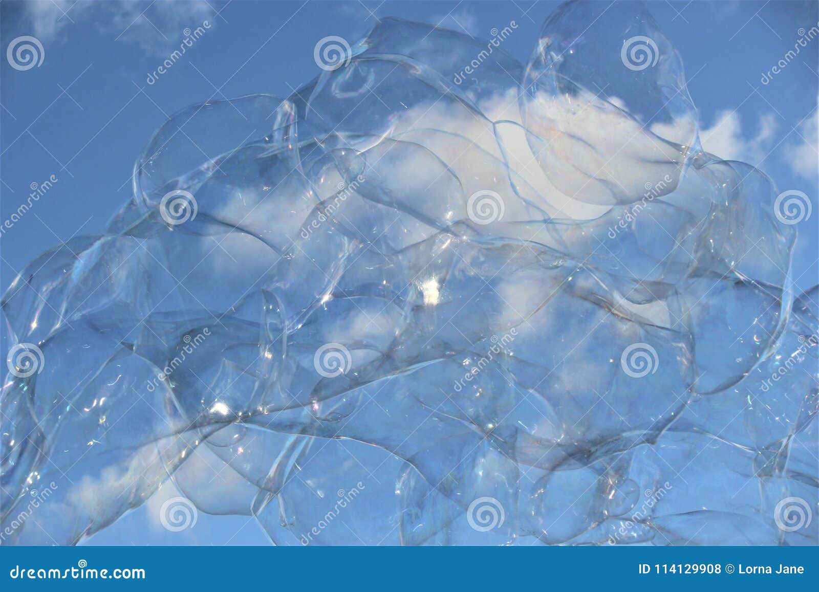 bubble bubbles floating soap drift in blue sky with clouds stock bubbles float