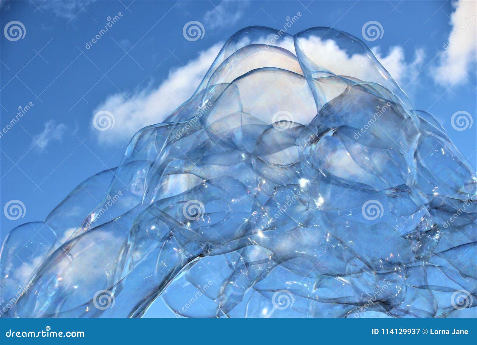 bubble bubbles floating soap drift in blue sky with clouds stock bubbles float