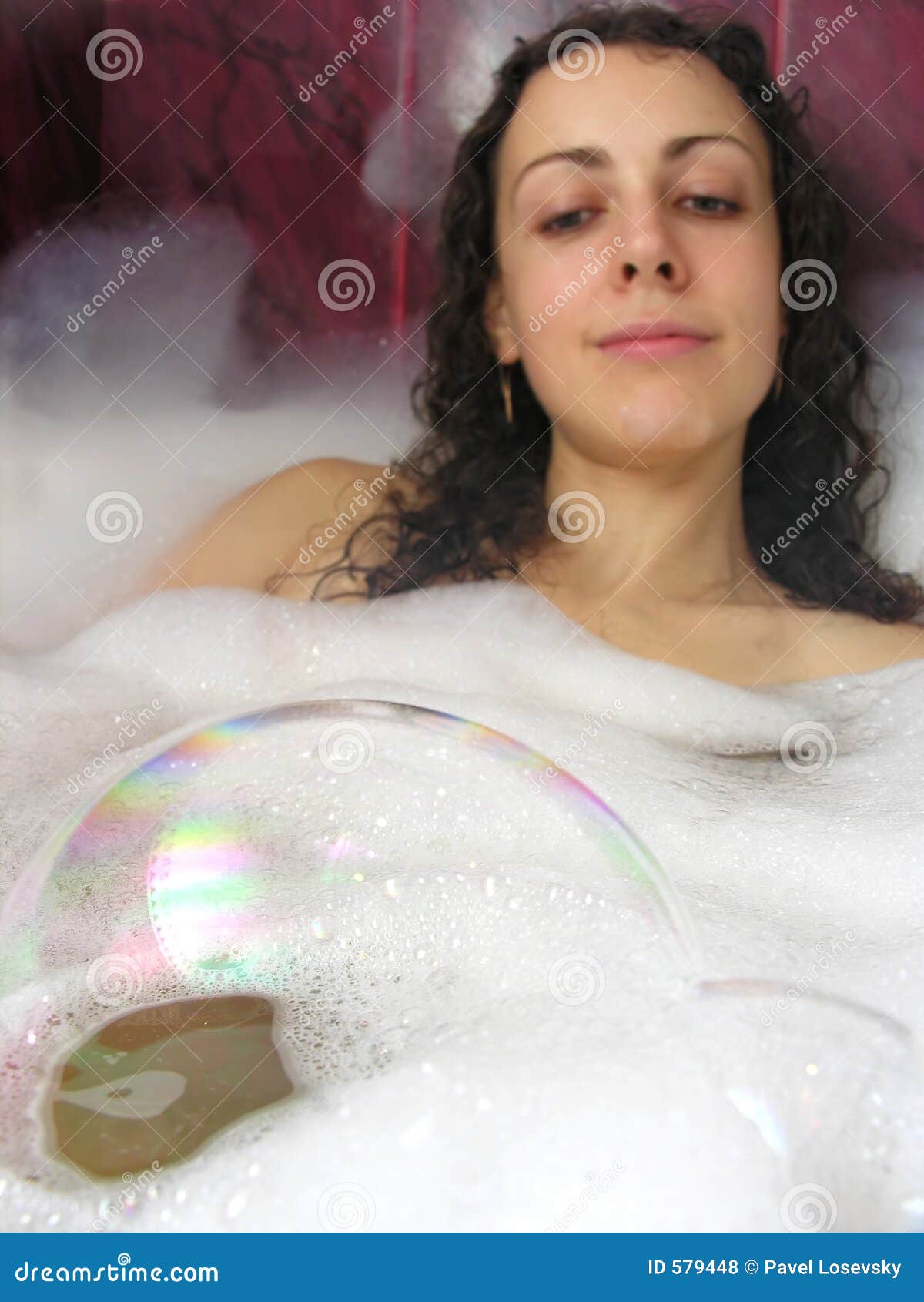 Bubble with girl in bath stock photo. Image of grownup 579448