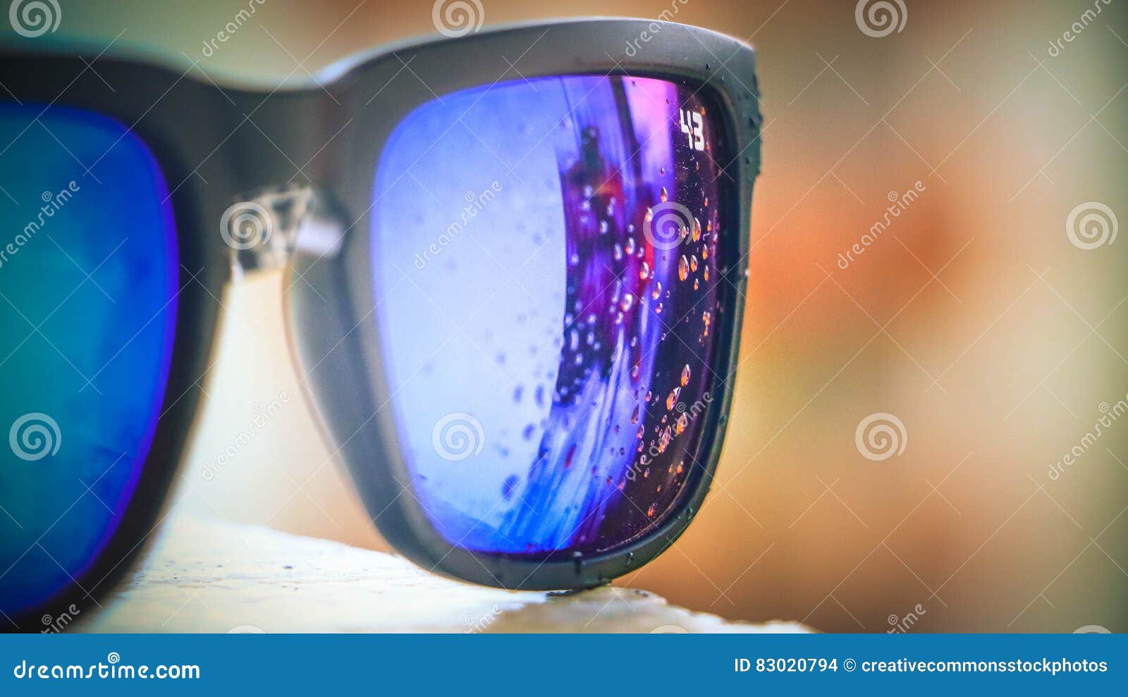 Bubbles Reflected On Lens Of Black Framed Sunglasses Picture. Image