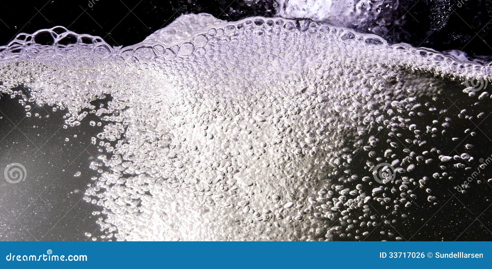 Bubbles in a water glass stock photo. Image of drink 33717026