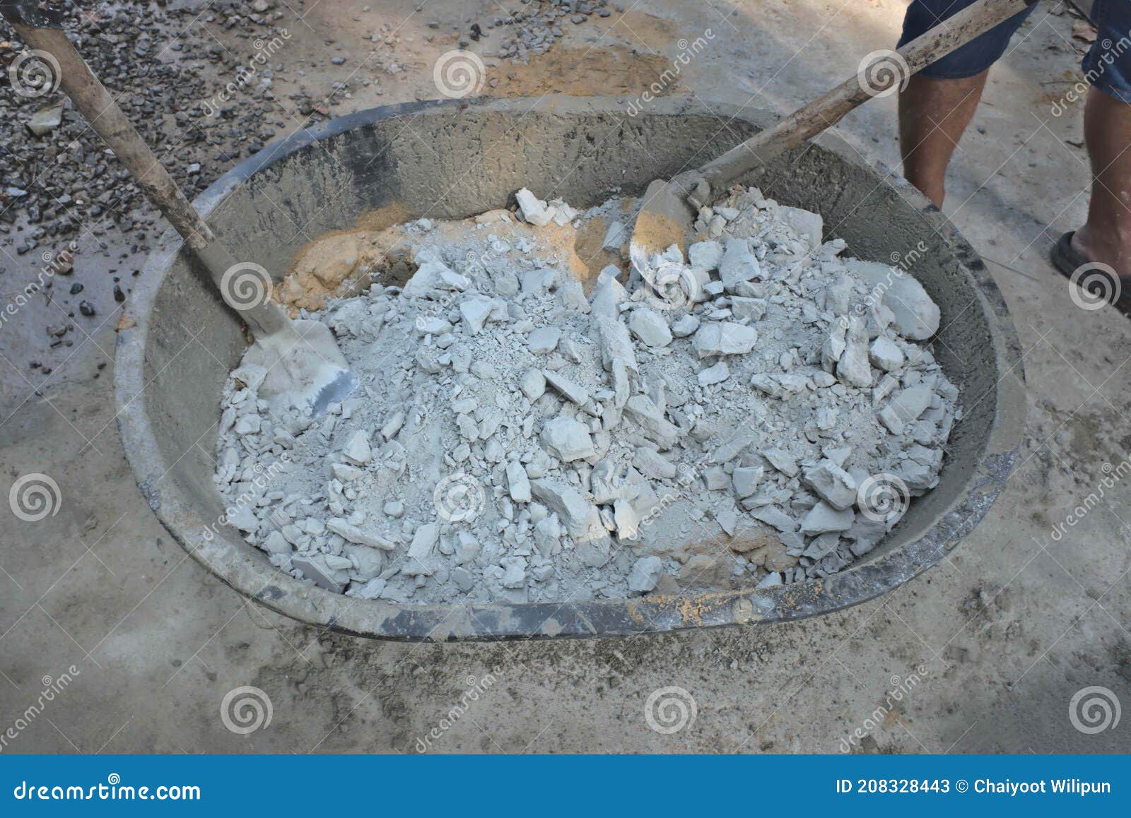 The Bucket of Cement, Sand, Shovel, Black Shovel on the Concrete