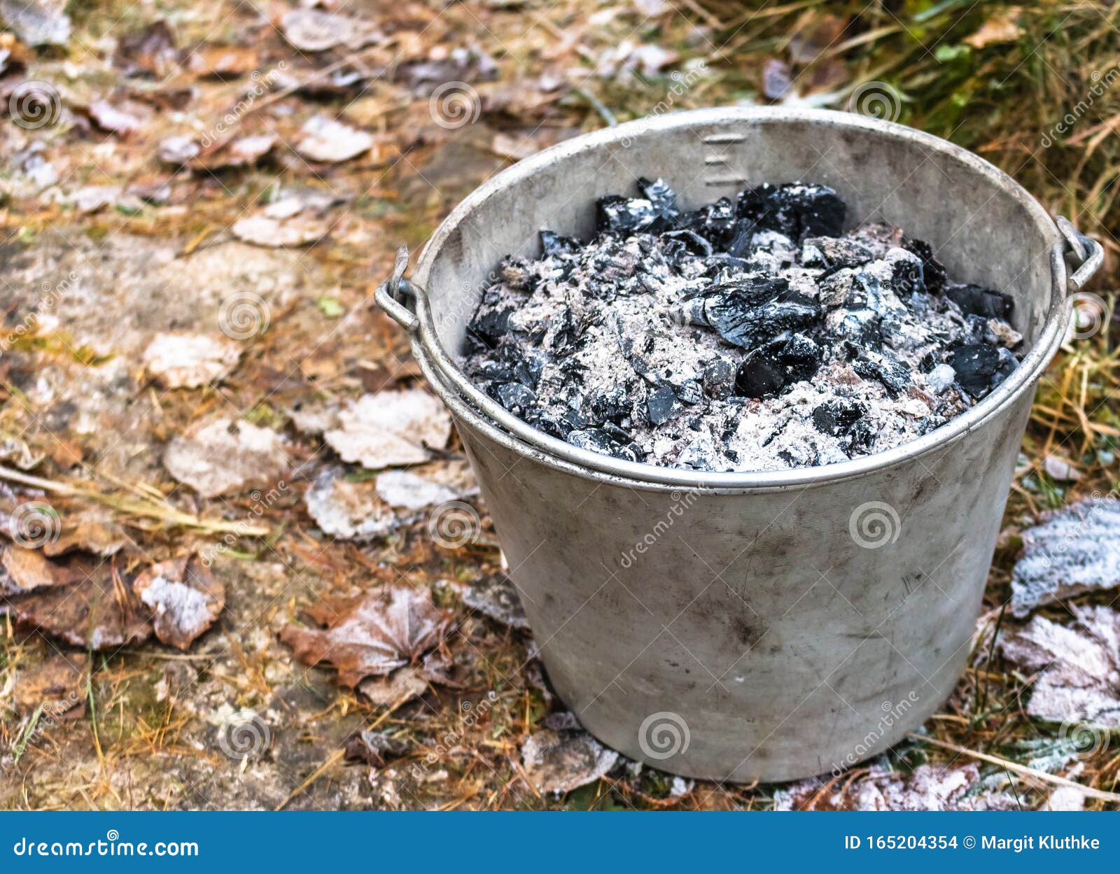 A Bucket Filled with Wood Ash from the Oven Stock Photo Image of copy, lumber 165204354