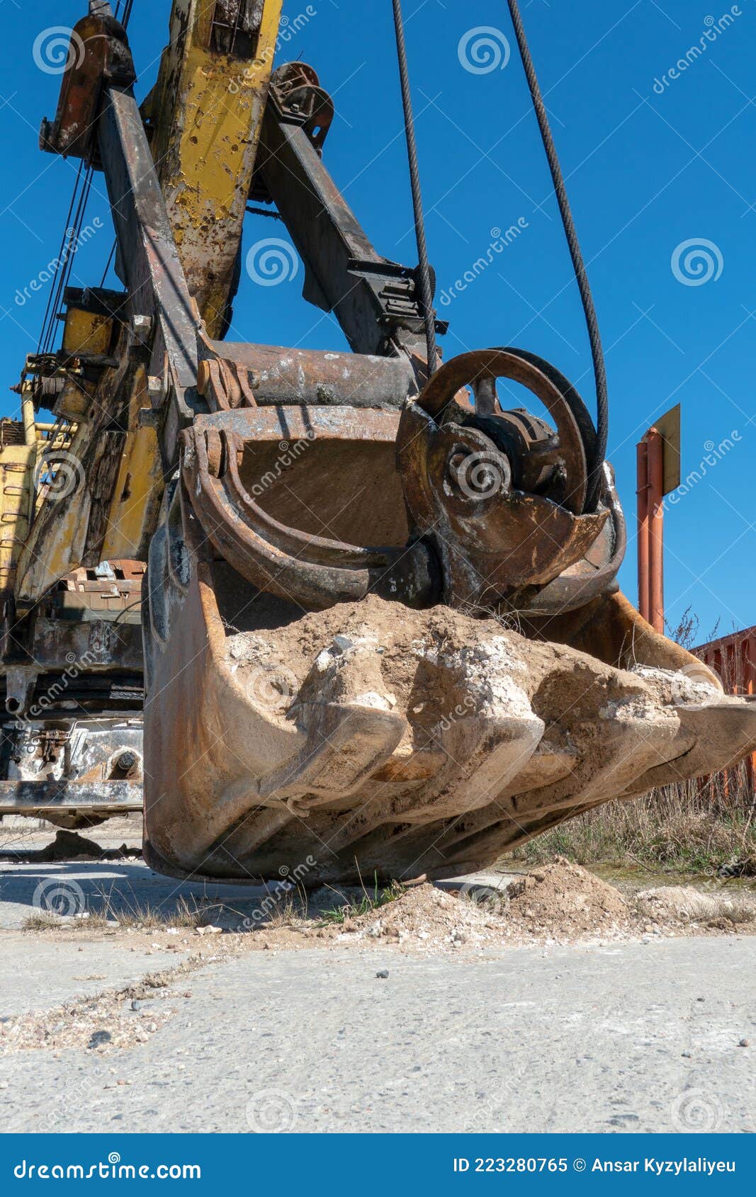 The Bucket of an Old Quarry Excavator is a Closeup. the Crawler