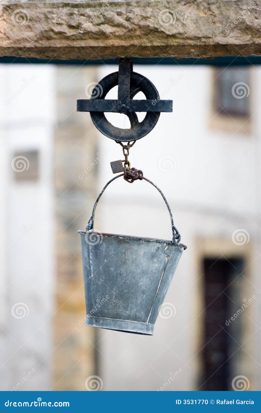 Bucket and pulley stock photo. Image of urbstone, sheave 3531770