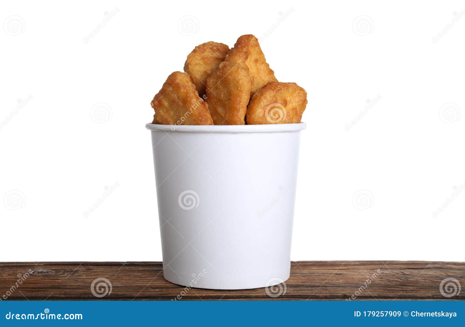 Download Bucket With Tasty Chicken Nuggets On Table Against White ...