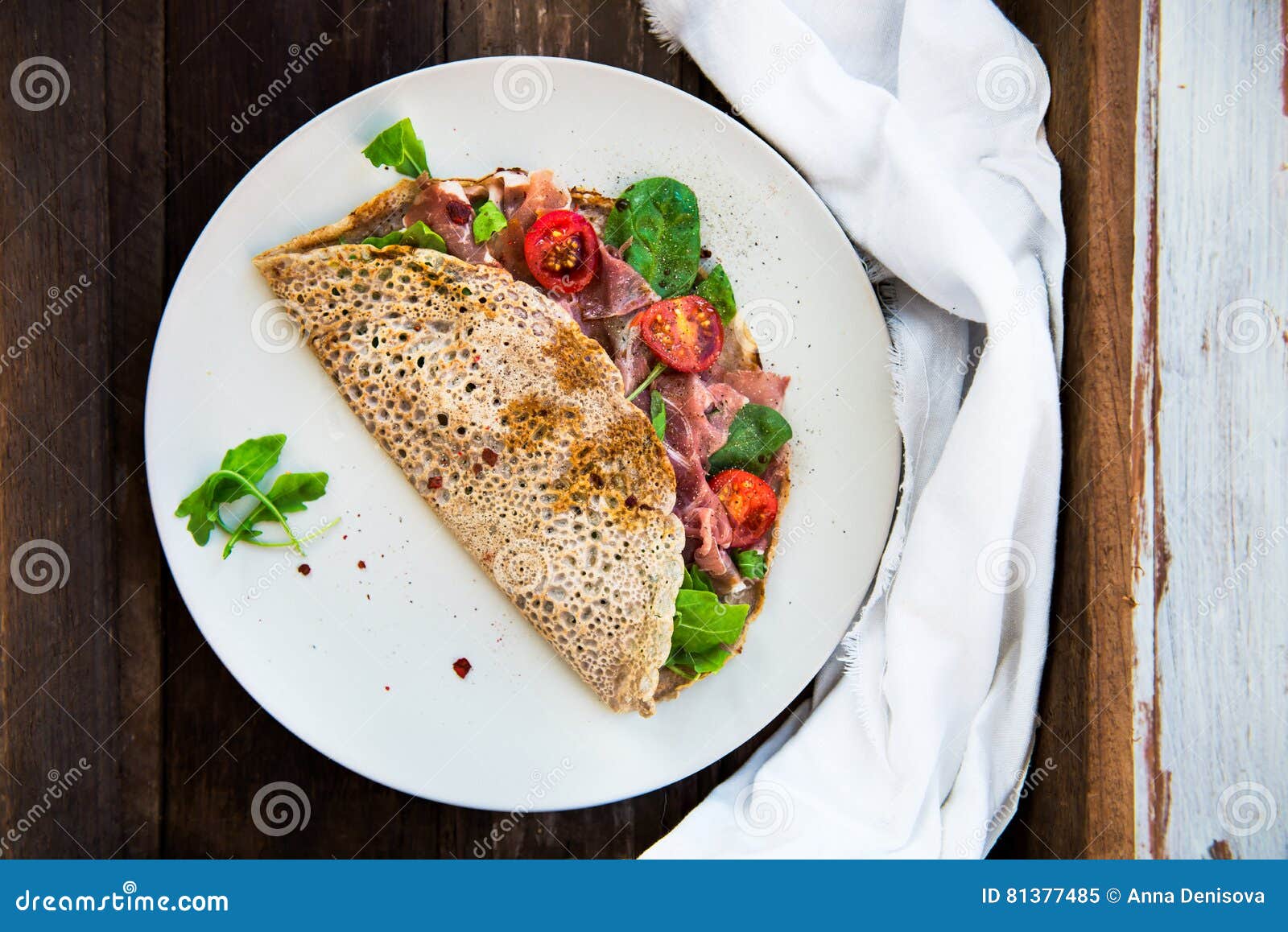 Buckwheat Pancakes with Cherry Tomatoes, Rocket Salad, Spinach, Stock