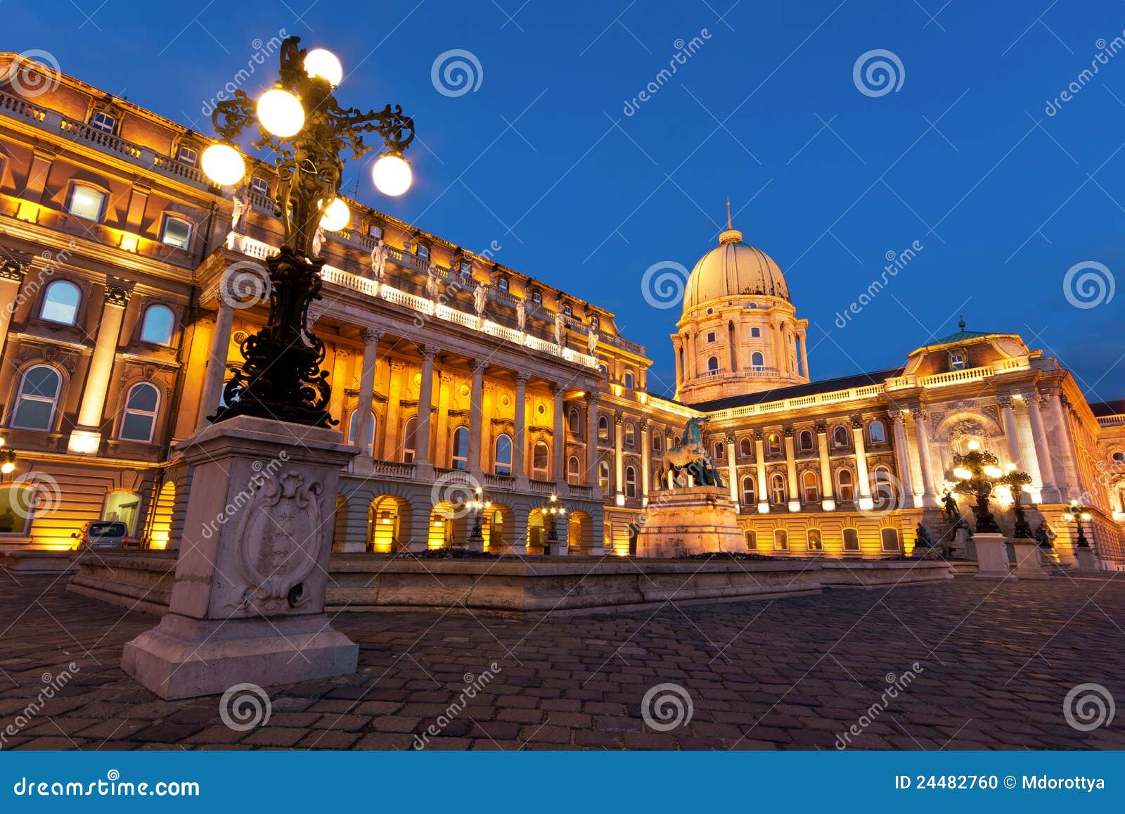 the buda castle in budapest with a streetlight