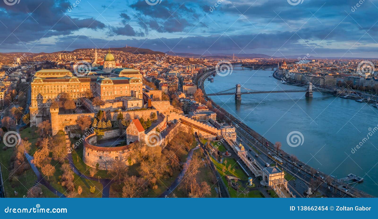 budapest, hungary - aerial panoramic view of buda castle royal palace with szechenyi chain bridge, parliament