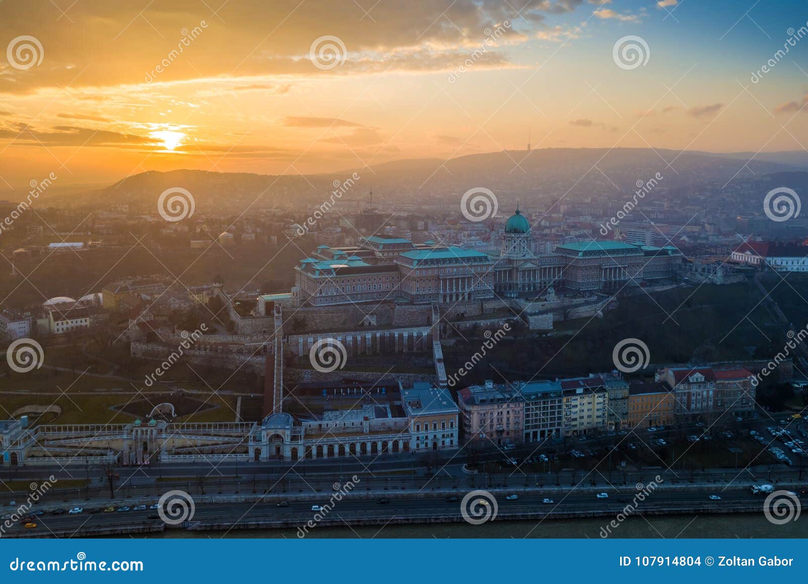 budapest, hungary - aerial sunset view of buda castle royal palace and varkert bazar
