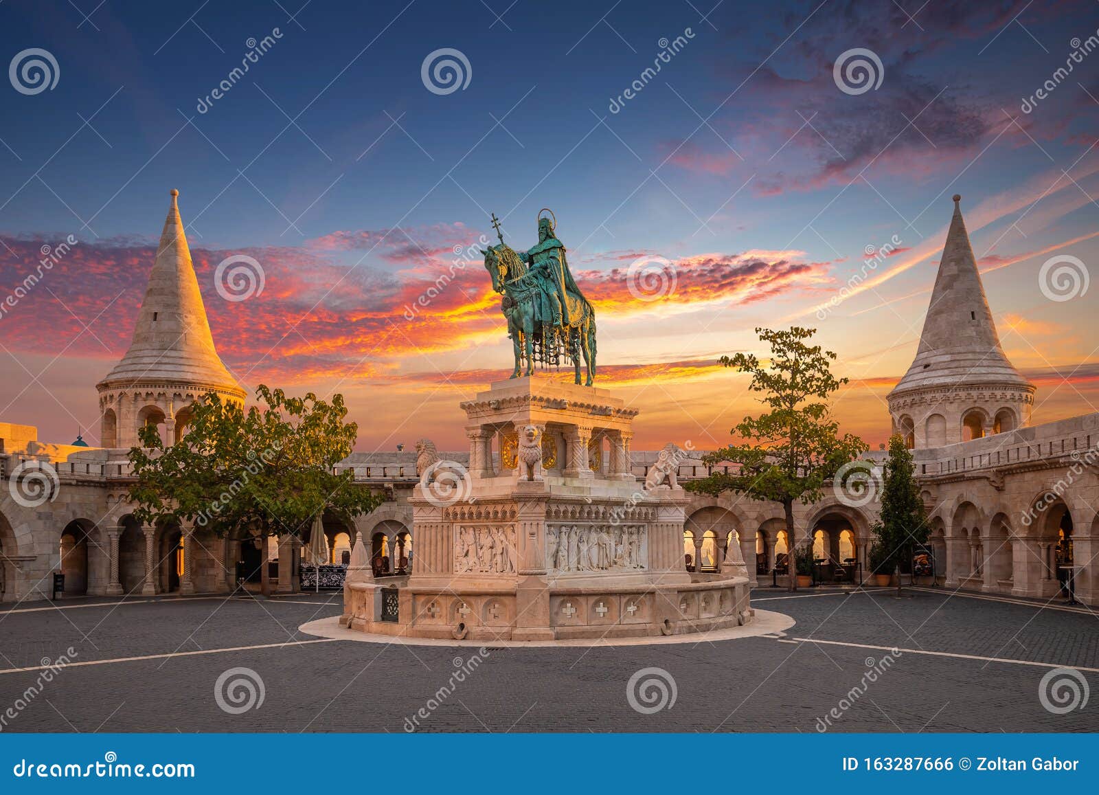 budapest, hungary - amazing golden sunrise over fisherman`s bastion at autumn with statue of king st.stephen