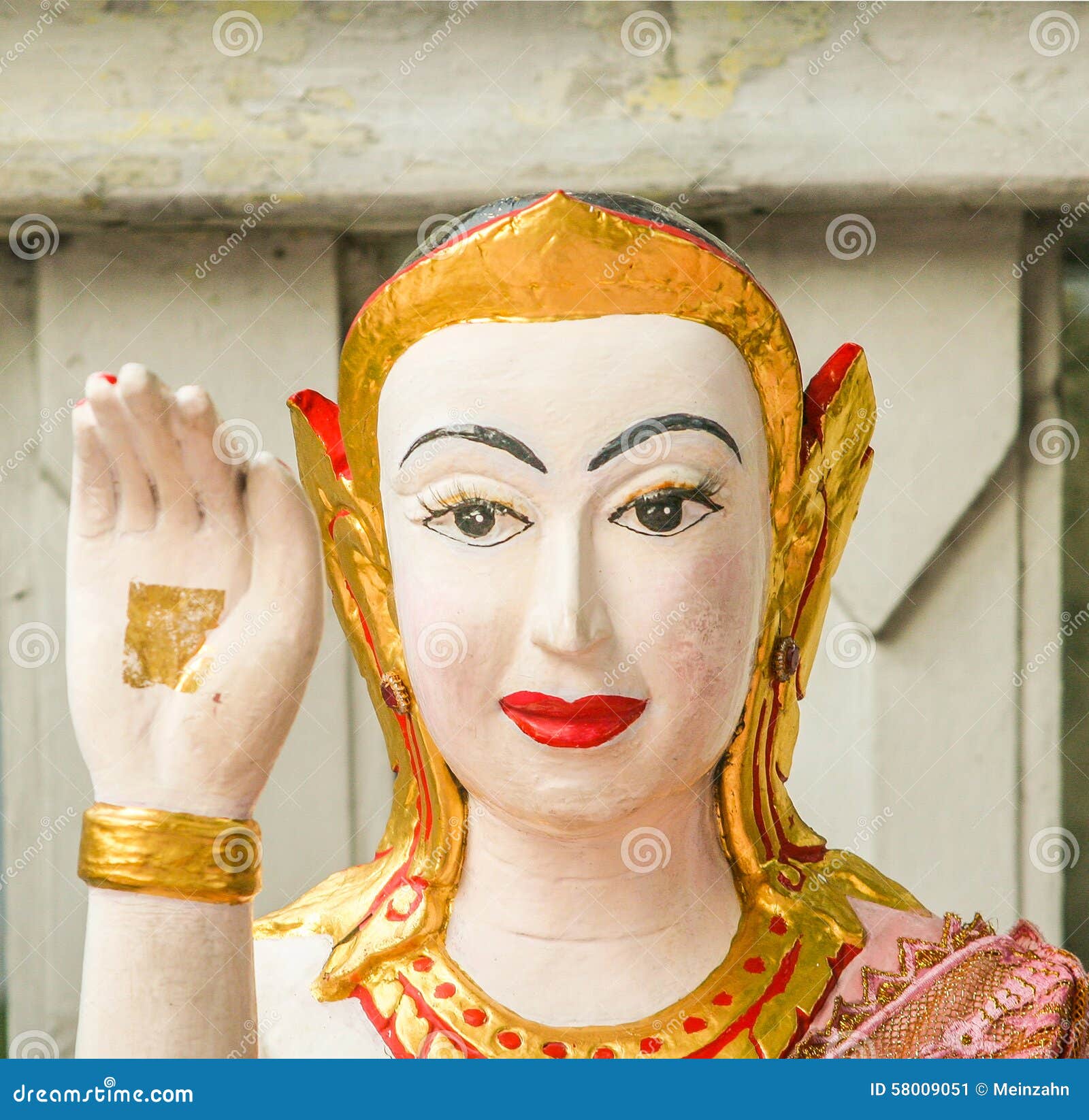 Buddha gives a peace sign stock image. Image of foil - 58009051