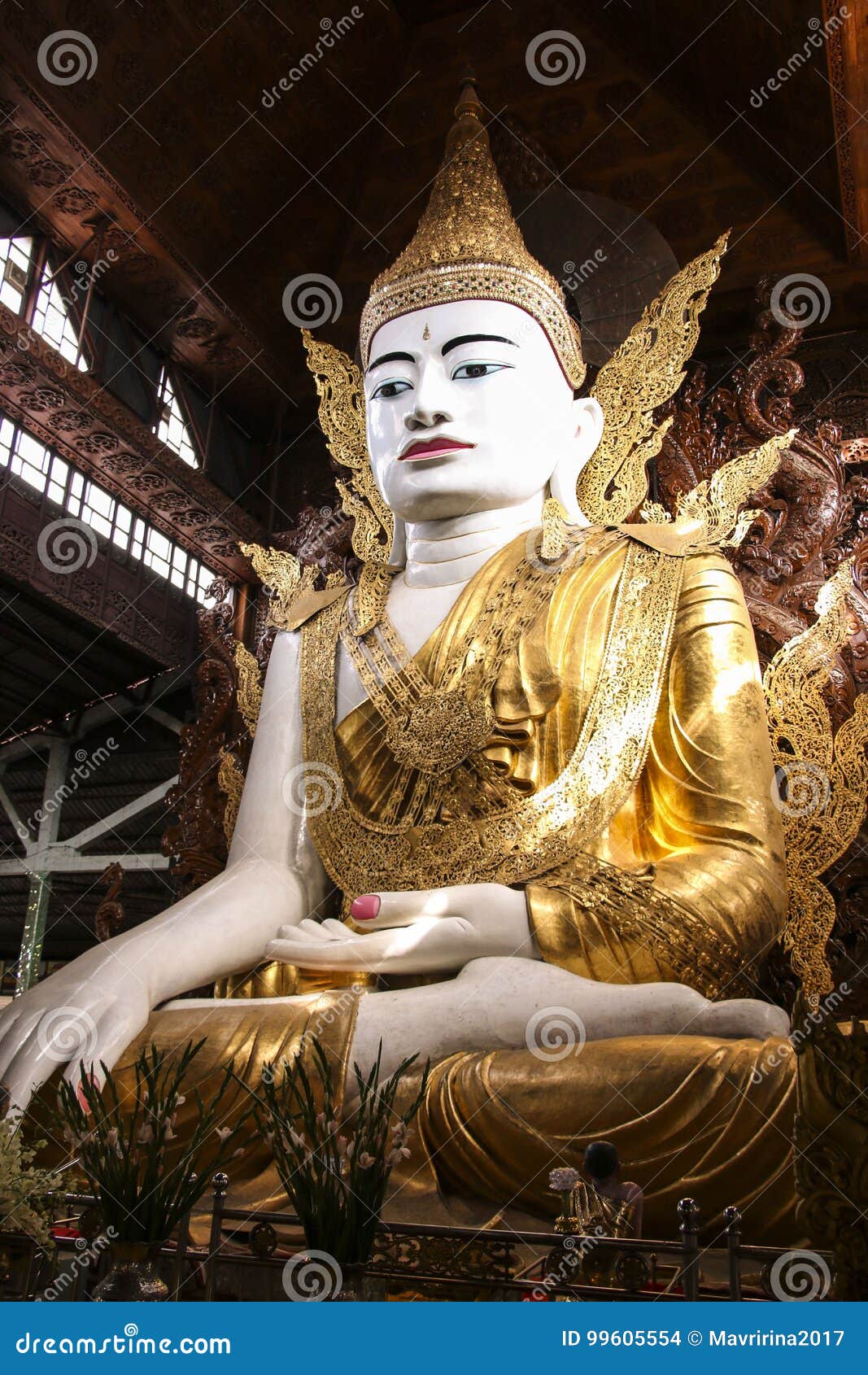 buddha in gold, royal clothes,ngar htat gyee pagoda,yangon, myanmar(burma)