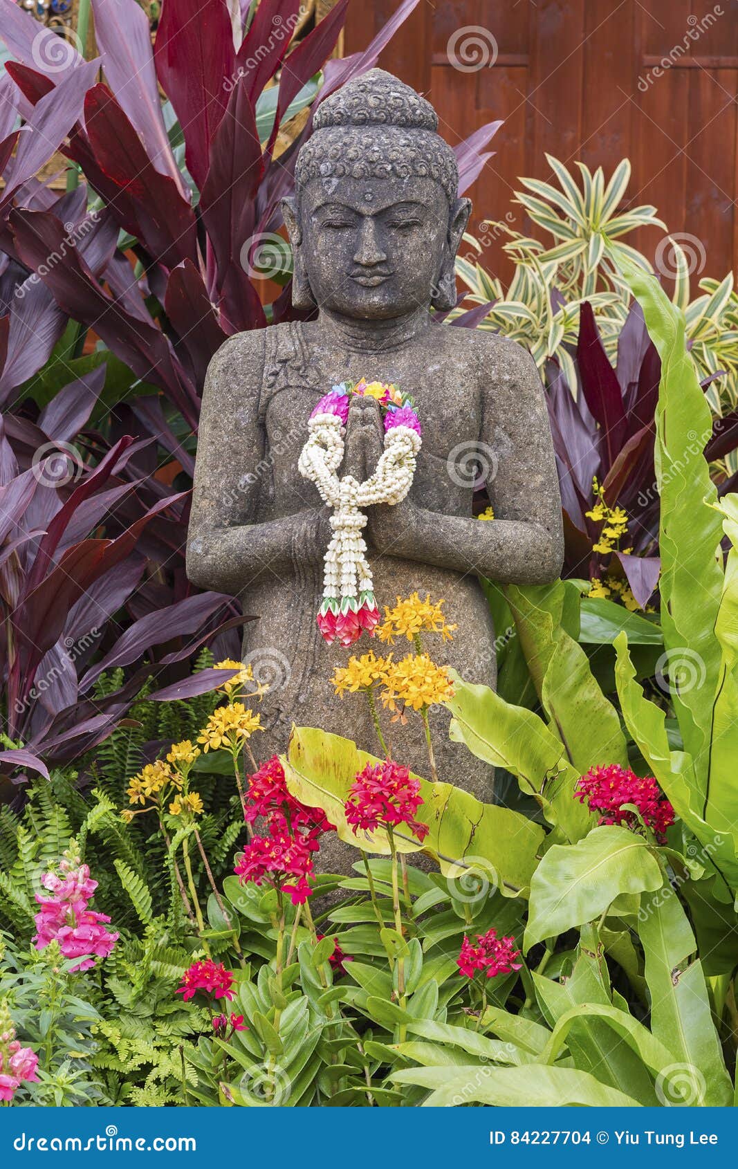 Buddha sculpture in garden stock photo. Image of exotic 84227704