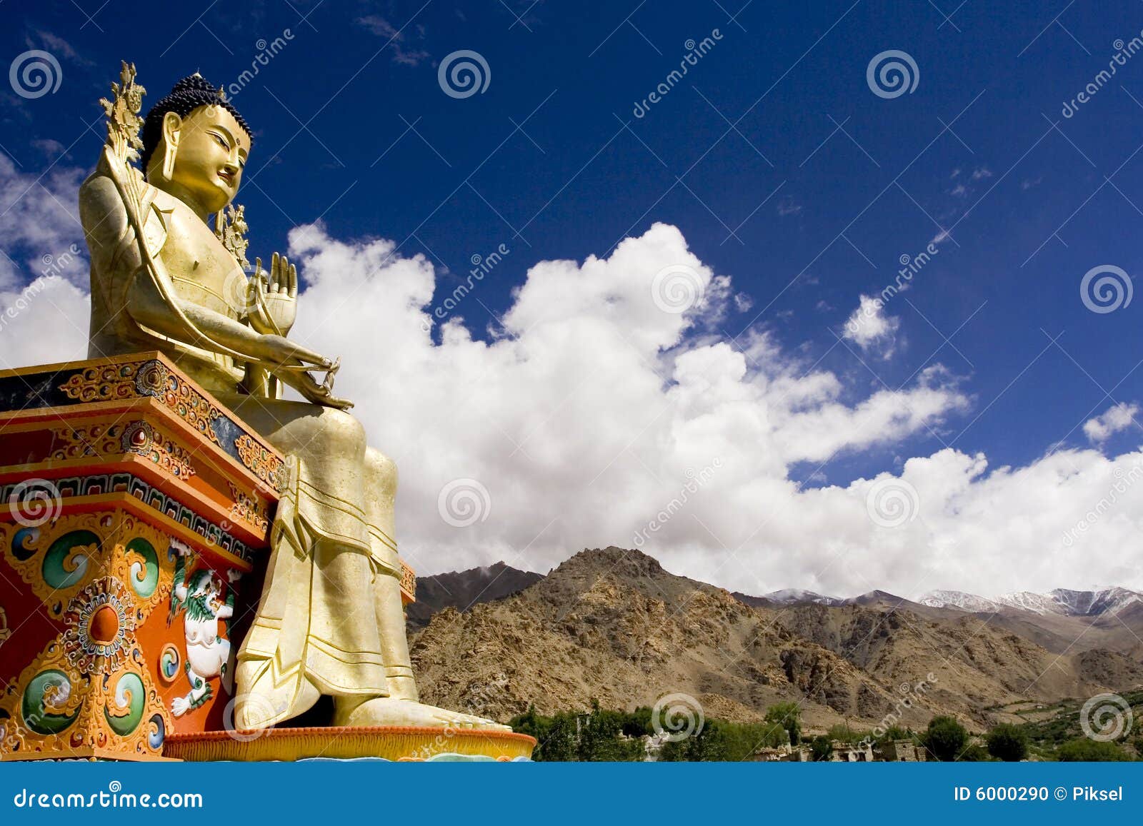 buddha statue and himalayas