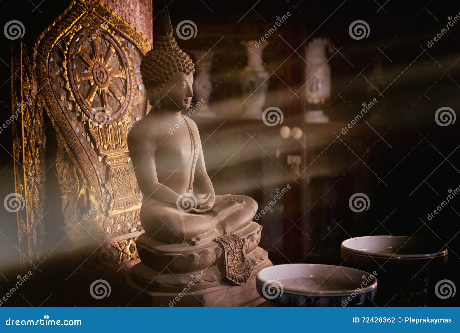 buddha statue and sun light