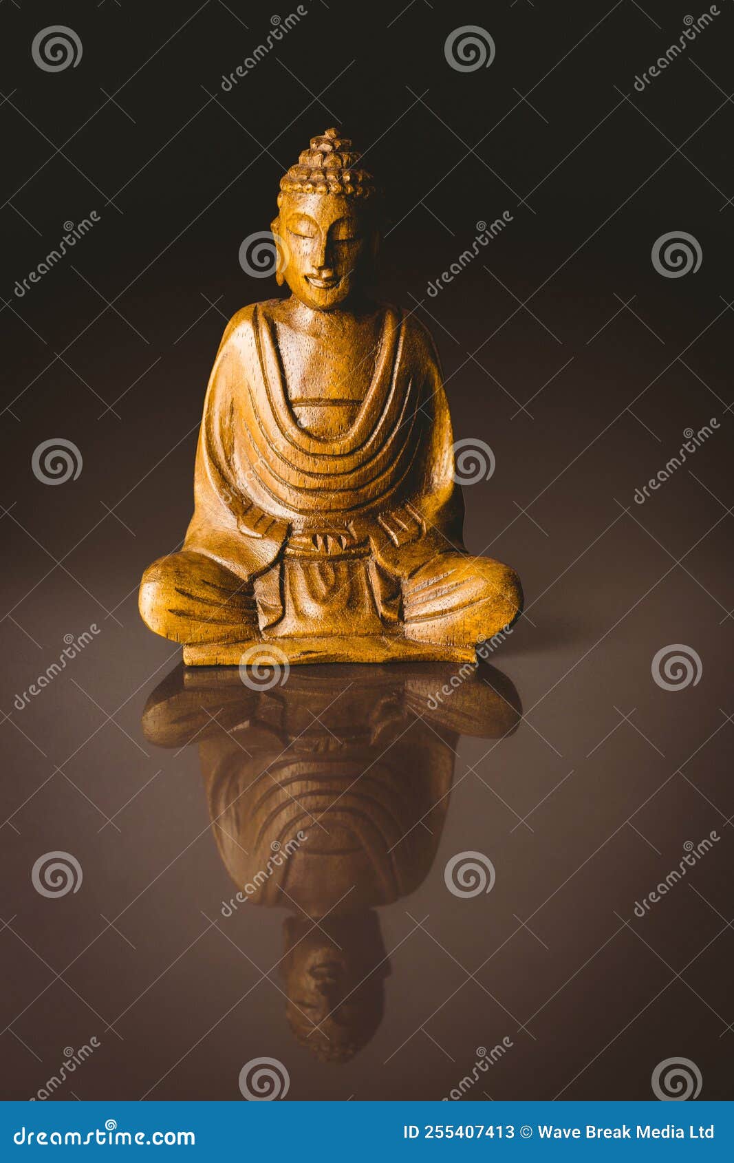 Buddha statue on table stock image. Image of figurine 255407413