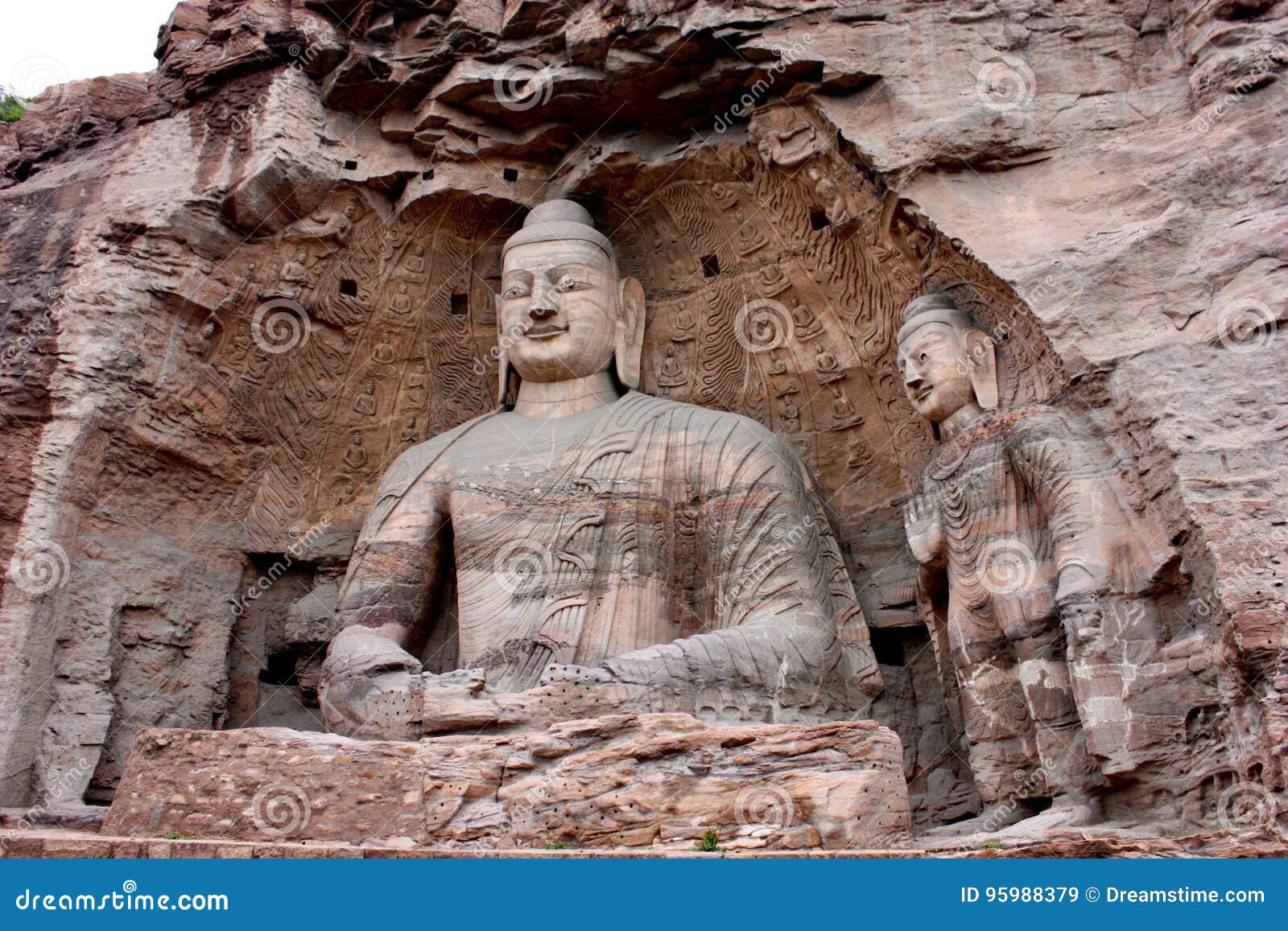 BuddhaStatuen in YungangGrotten, Datong, China Stockbild Bild von