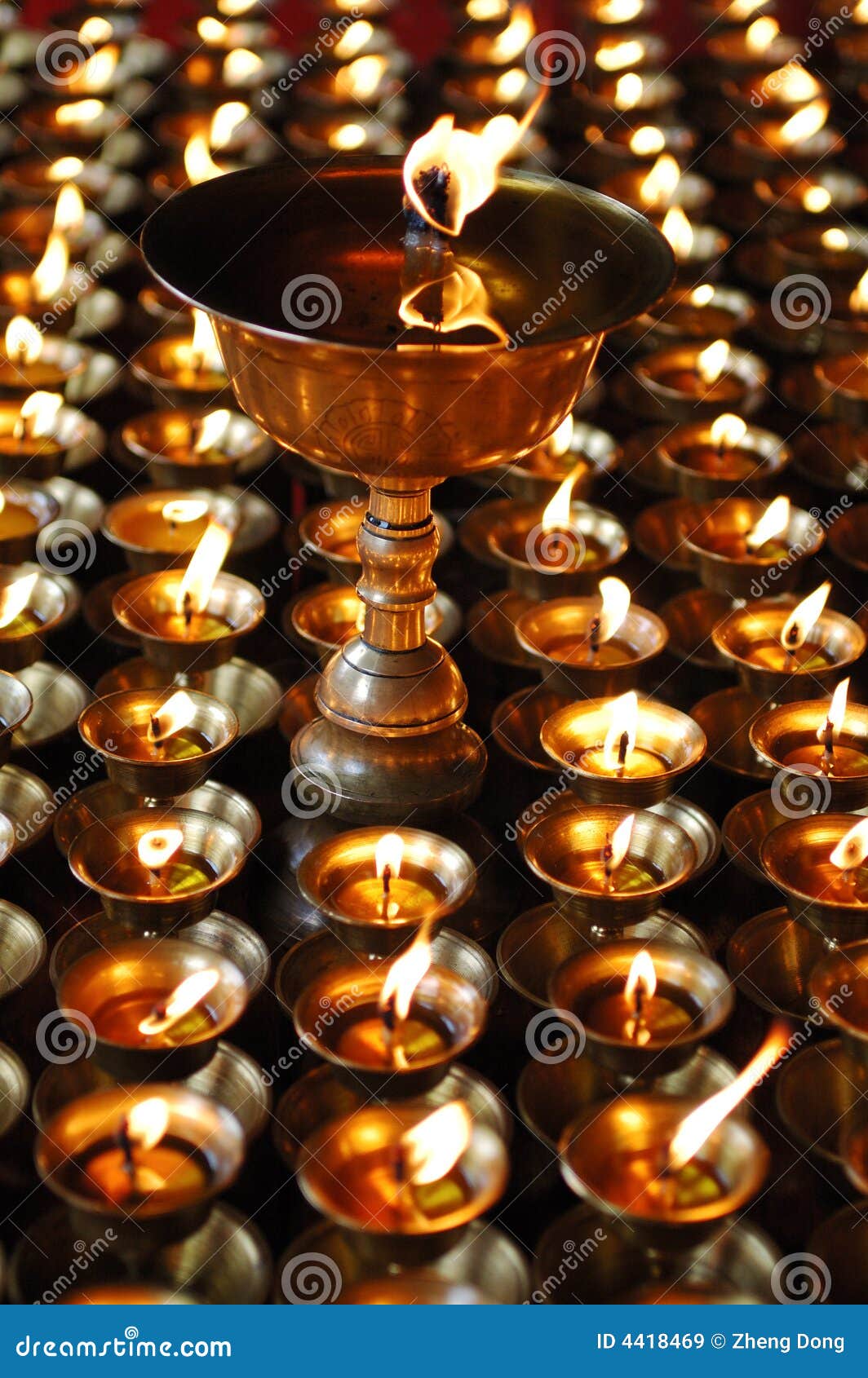 Buddhist butter lamps stock image. Image of container 4418469