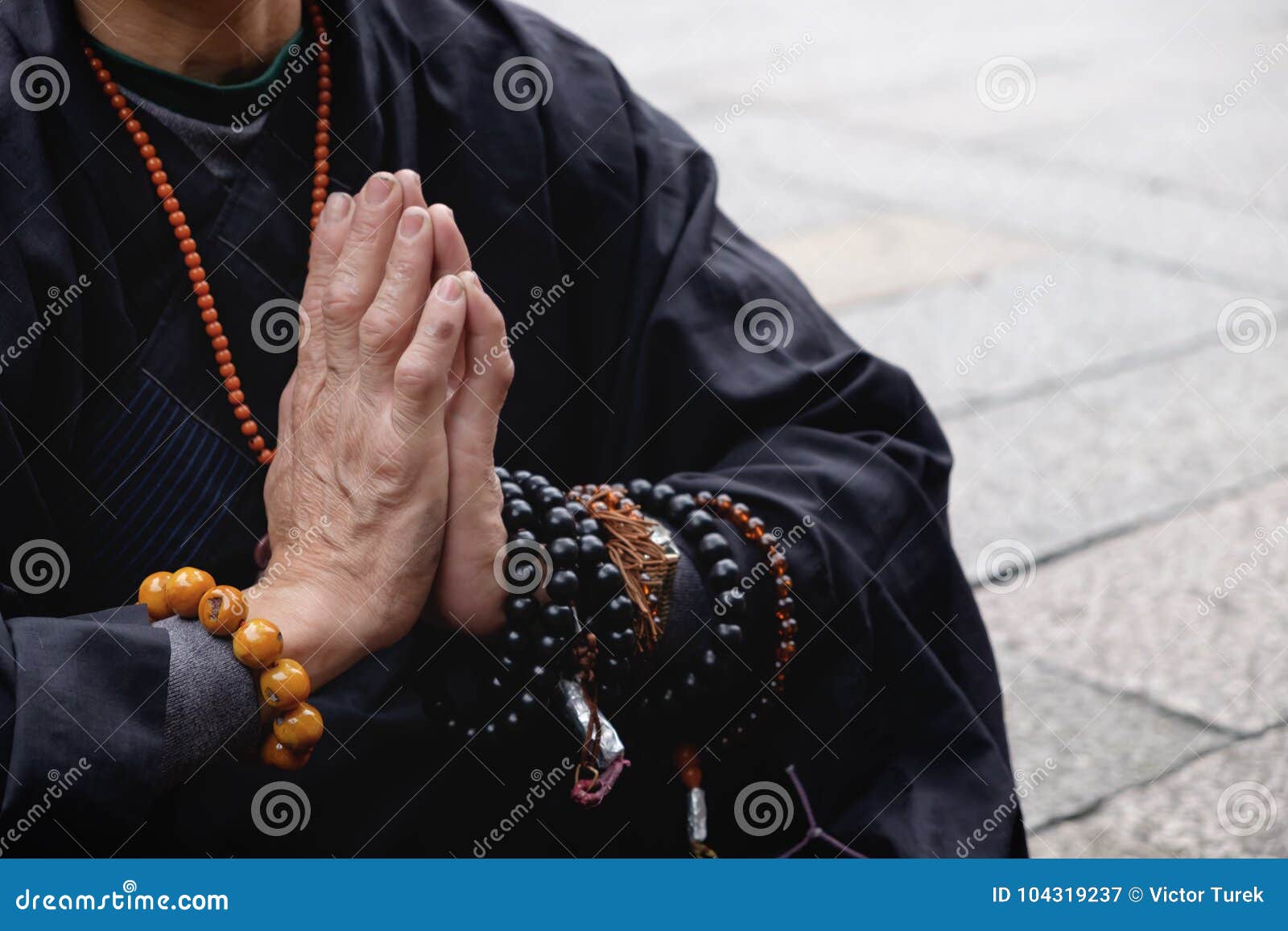 buddhist monk praying