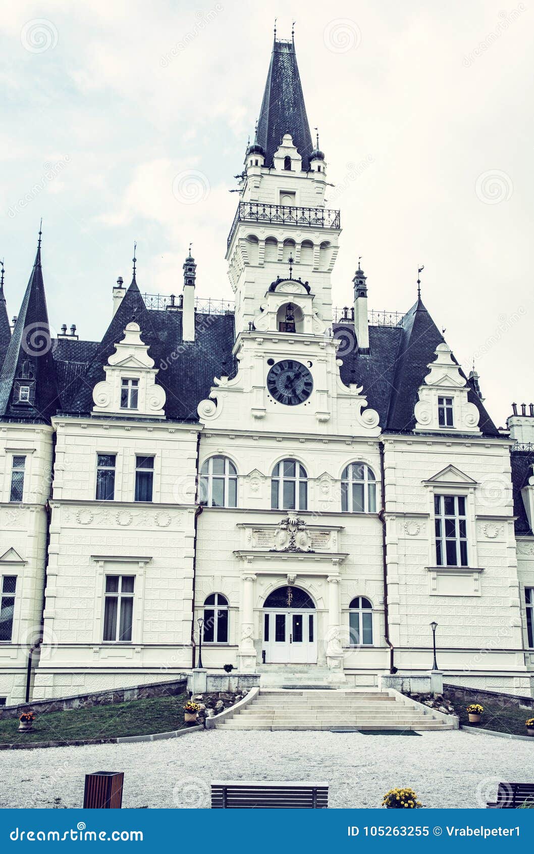 Budmerice castle in Slovak republic, blue filter. Beautiful Budmerice castle in Slovak republic. Architectural theme. Cultural heritage. Vertical composition. Travel destination. Blue photo filter.