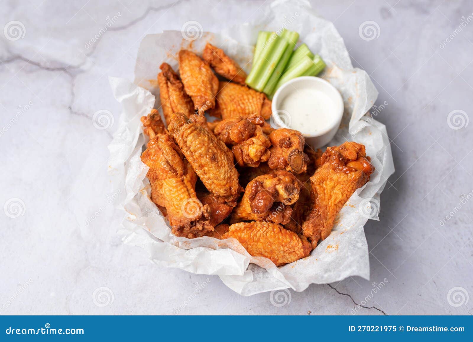 buffalo chicken wings with celery and dip