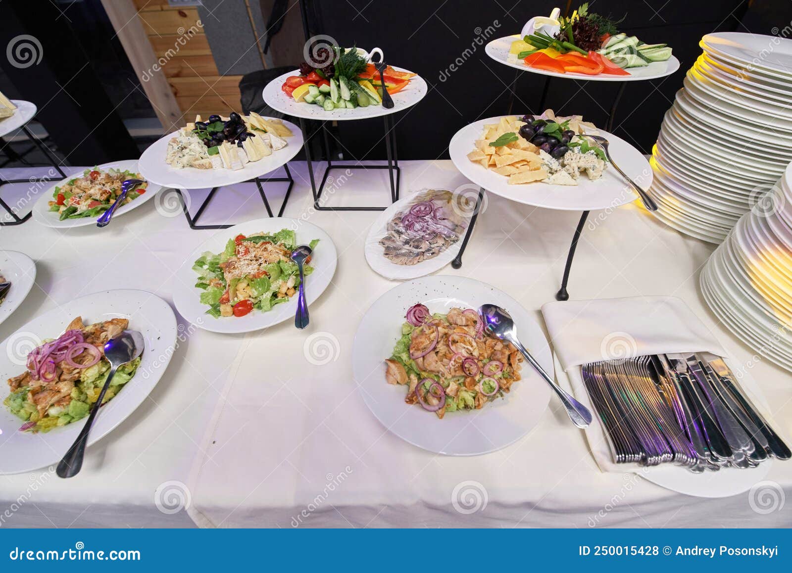 Buffet with Appetizers, Salads in Plates at the Banquet Stock Photo