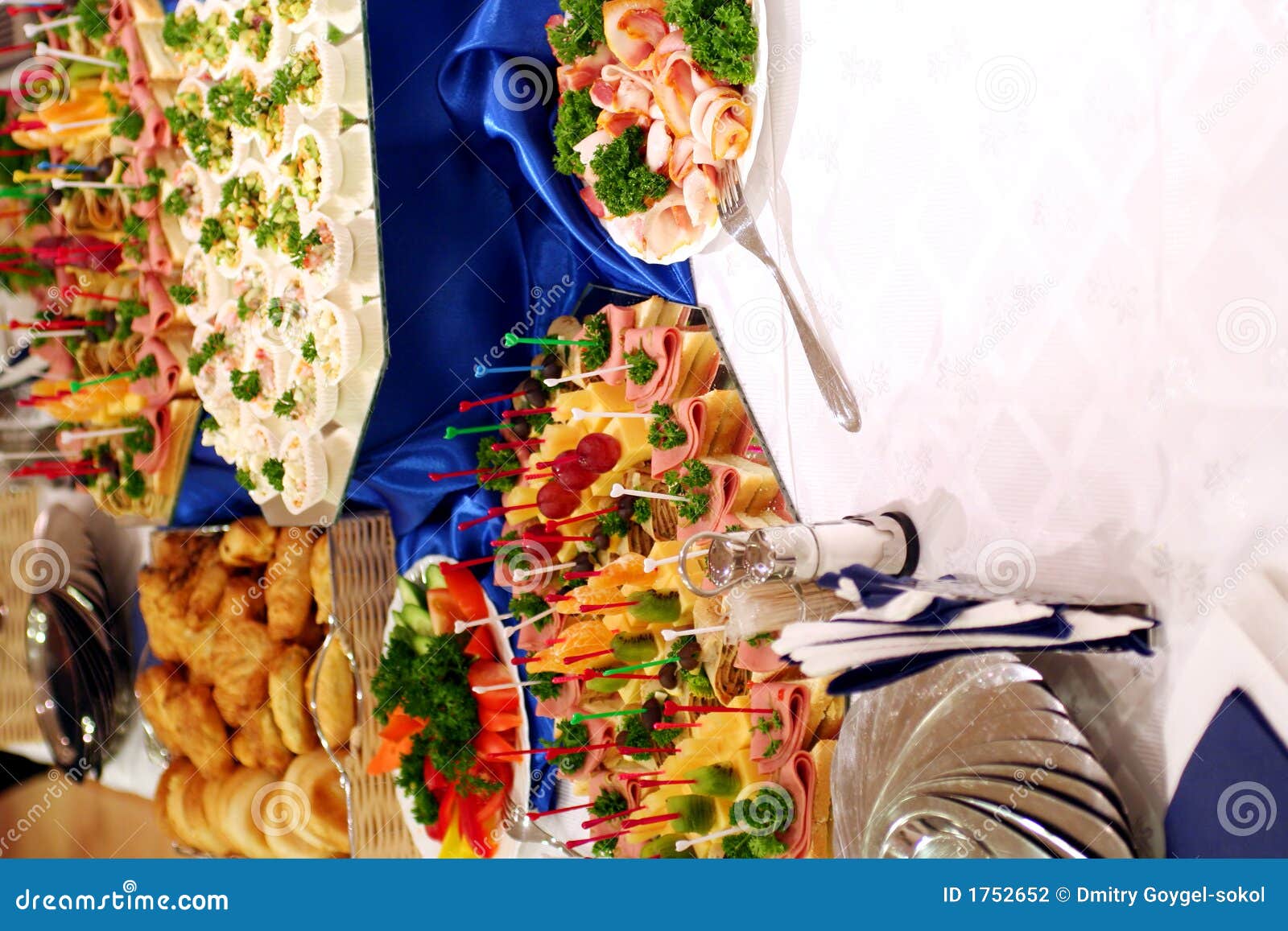 Buffet With Snacks At Presentation And People Behind Stock Photo