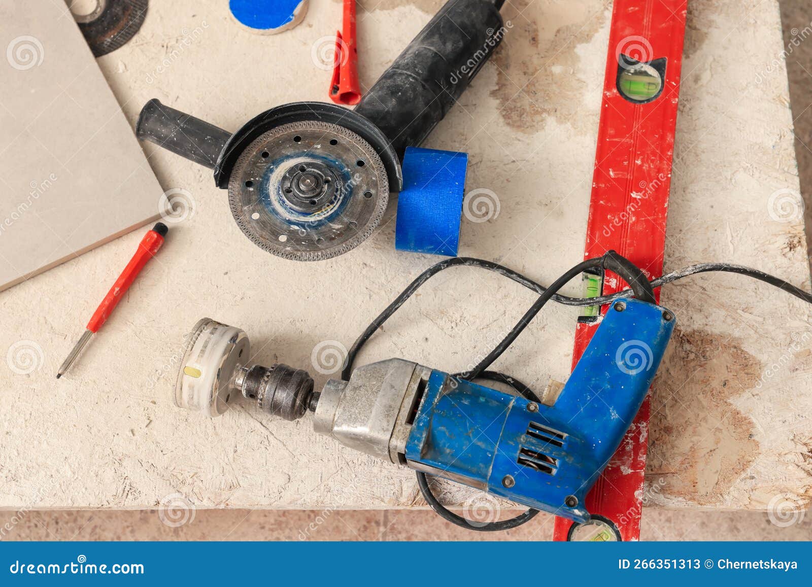 Buffing Attachment Drill and Saw on Chipboard Indoors. Tiles
