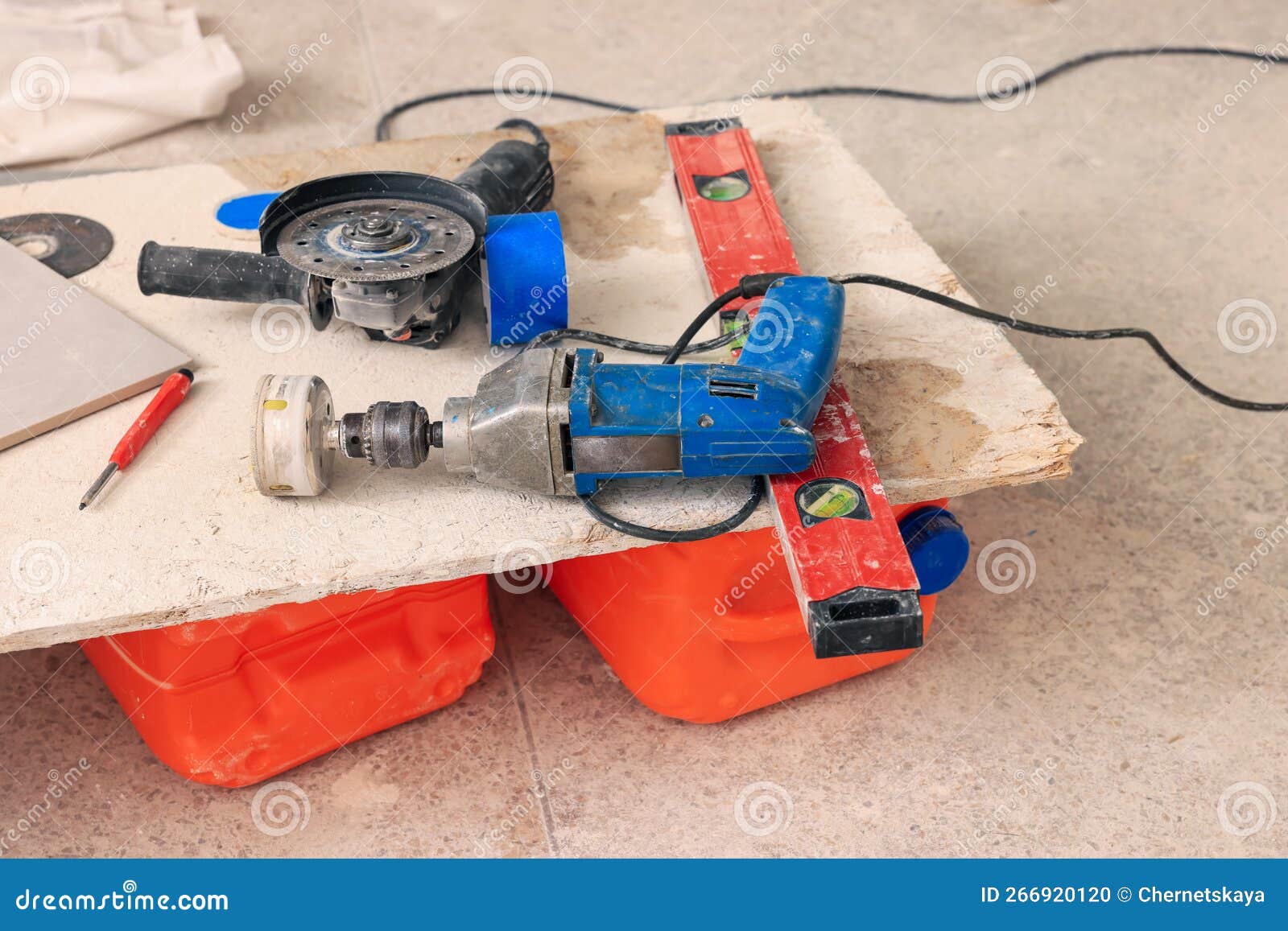 Buffing Attachment Drill and Saw on Chipboard Indoors. Tiles