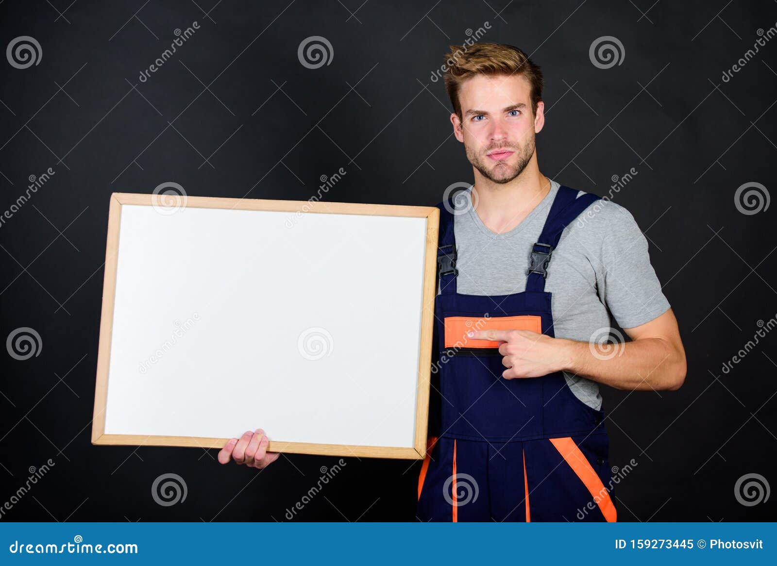build your future. turnkey project. man builder in work clothes. man hold blackboard, copy space. skilled architect