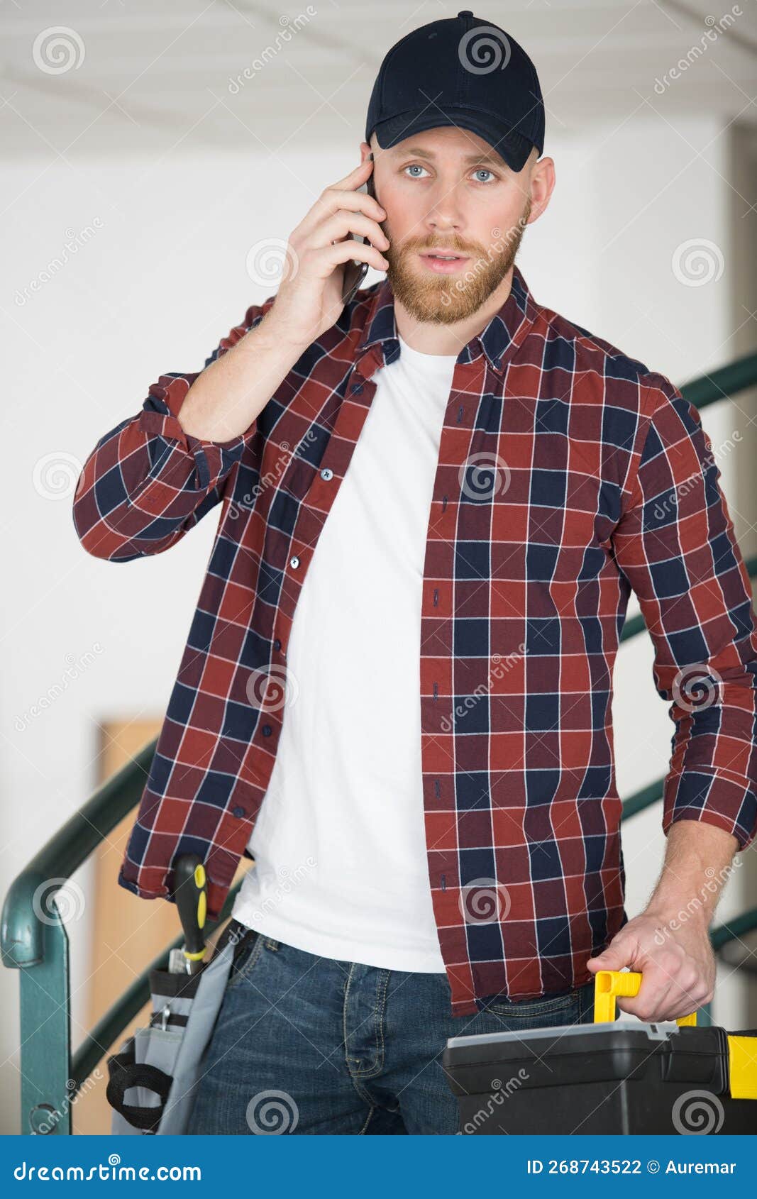 Builder or Craftsman Using Phone and Carrying Toolbox Stock Photo Image of stair, realestate