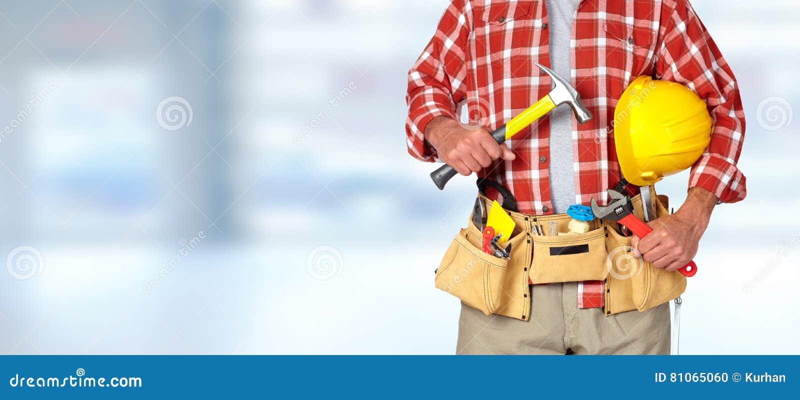 builder handyman with construction tools.