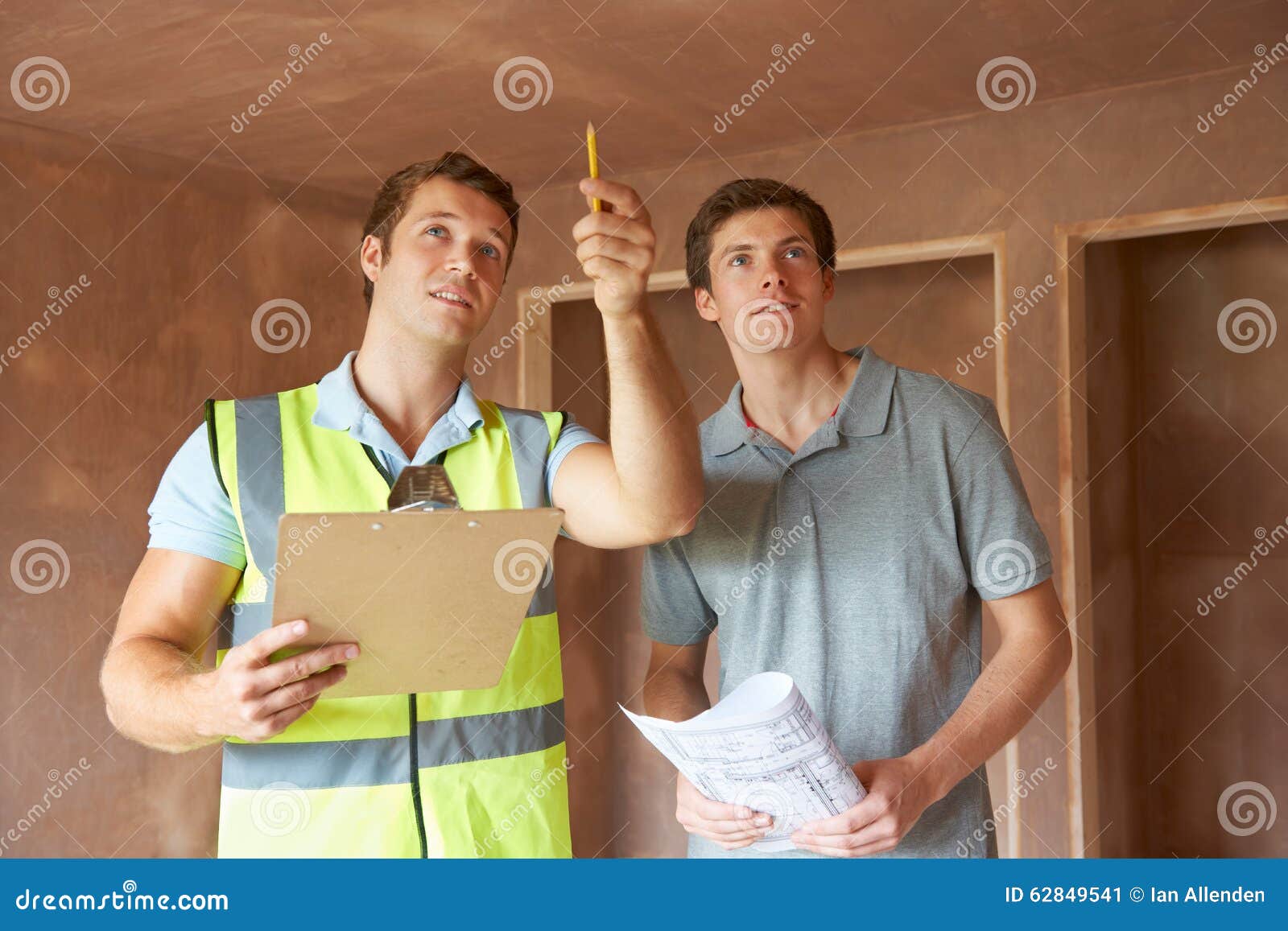 builder and inspector looking at new property