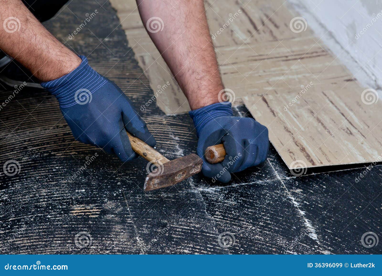 Builder Lifting Old Floor Tiles In A Passage Stock Image Image