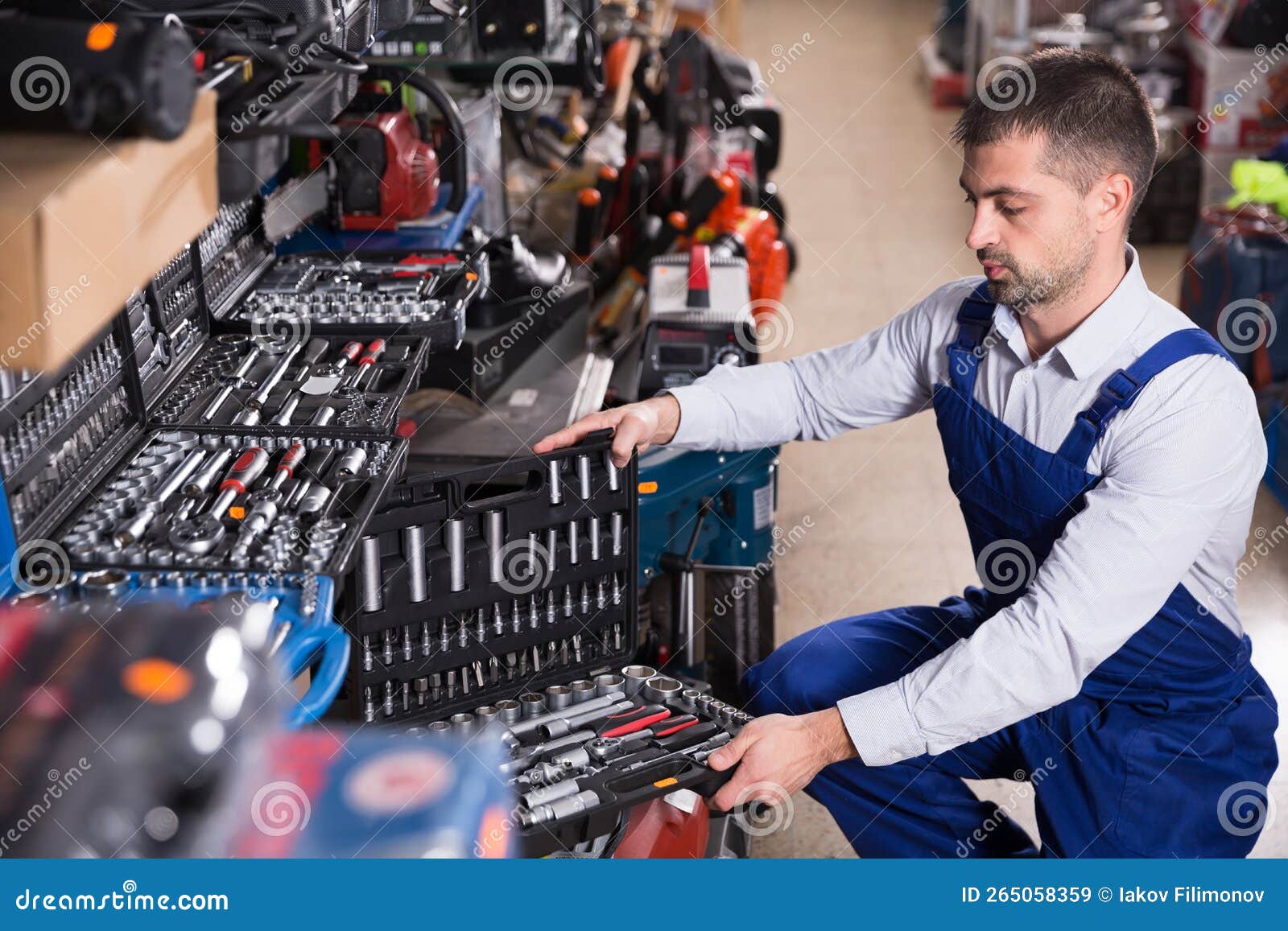 Builder is Looking on Box with Tools Stock Image Image of purchase