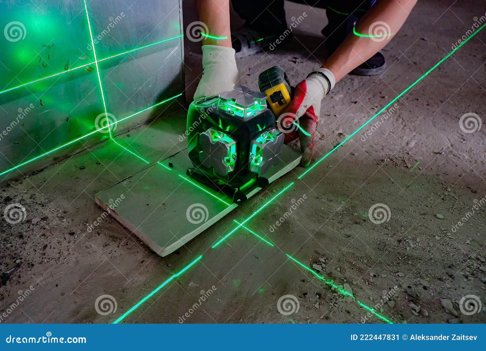 The Builder Measures the Repair Lines Using a Green Laser Level Stock Image Image of control