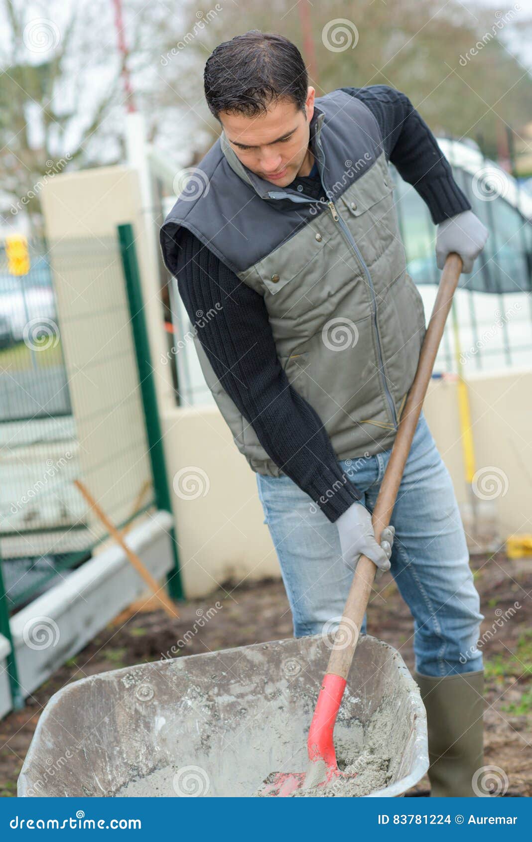 Builder Mixing Cement in Wheelbarrow Stock Photo Image of construct