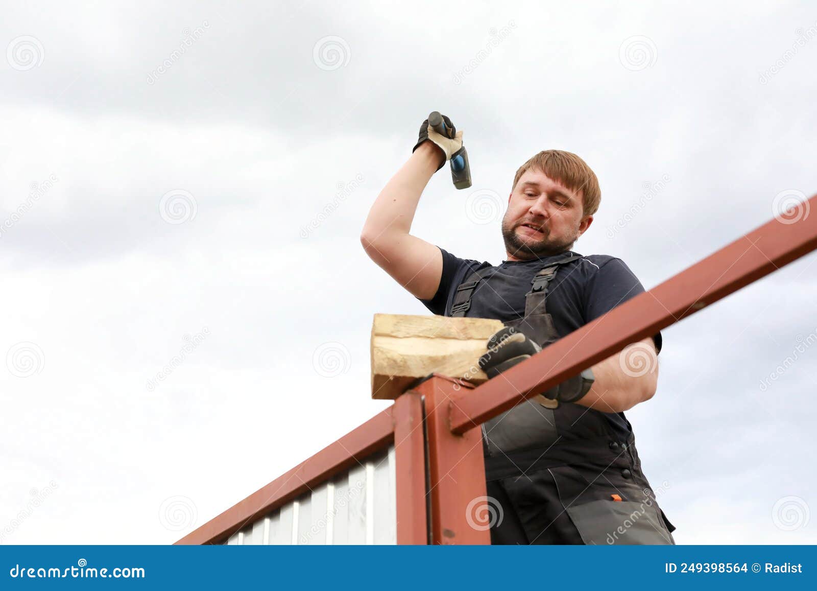 Builder Pounding Fence Post with Hammer Stock Photo Image of metal