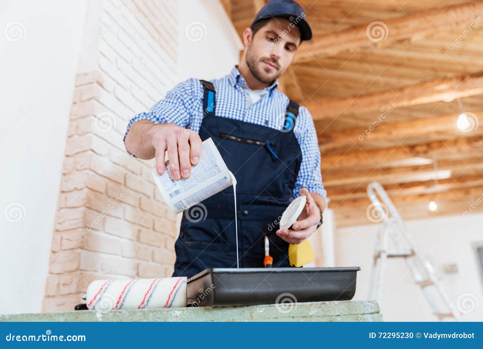 Builder Pouring Paint, Primer in a Paint Tray Stock Photo Image of